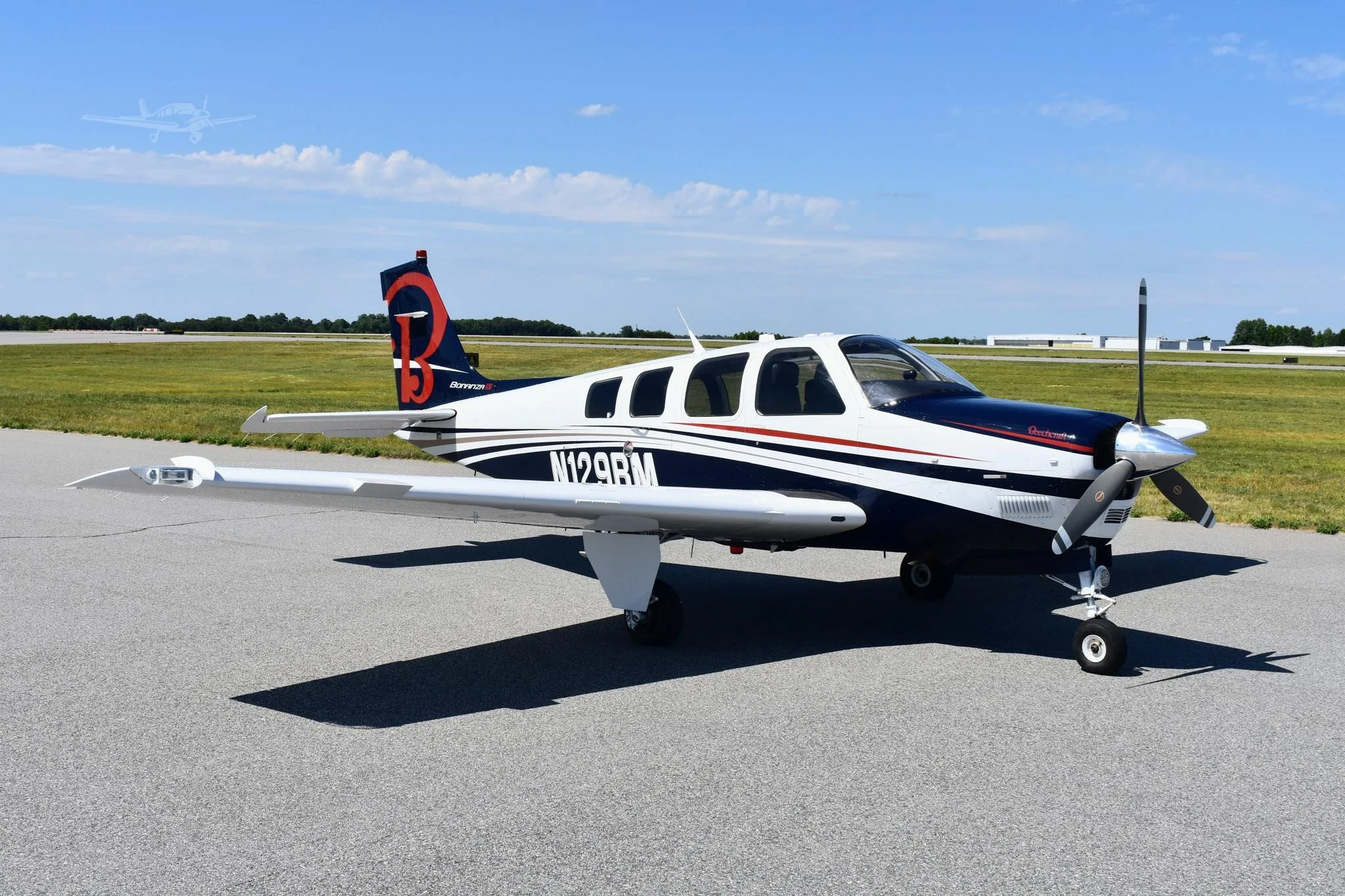 Exterior view of a 2005 BEECHCRAFT A36 BONANZA, N129BM.