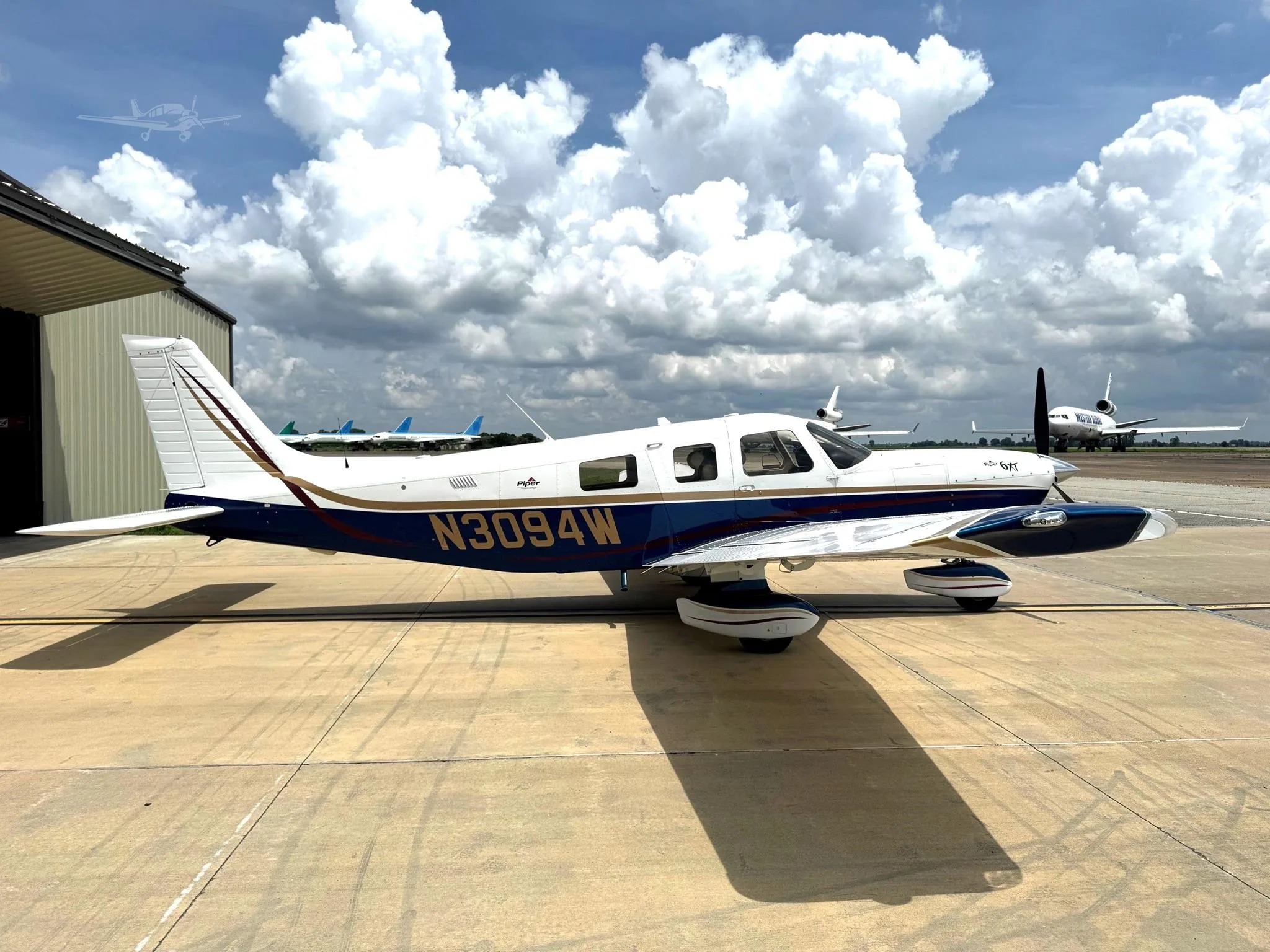 Exterior view of a 2005 PIPER 6XT, N3094W.