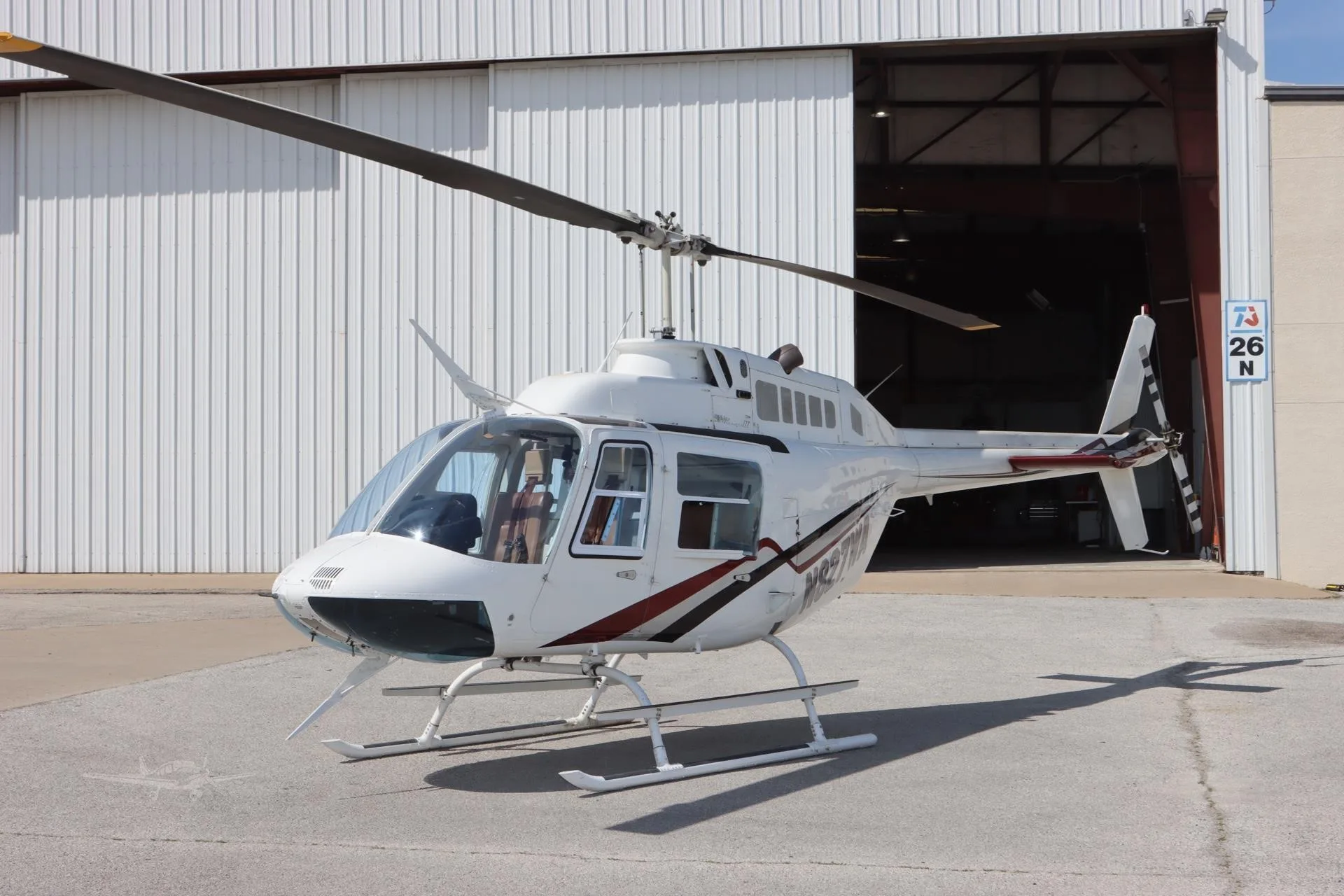 Exterior view of a 1995 BELL 206B III, N827WA.