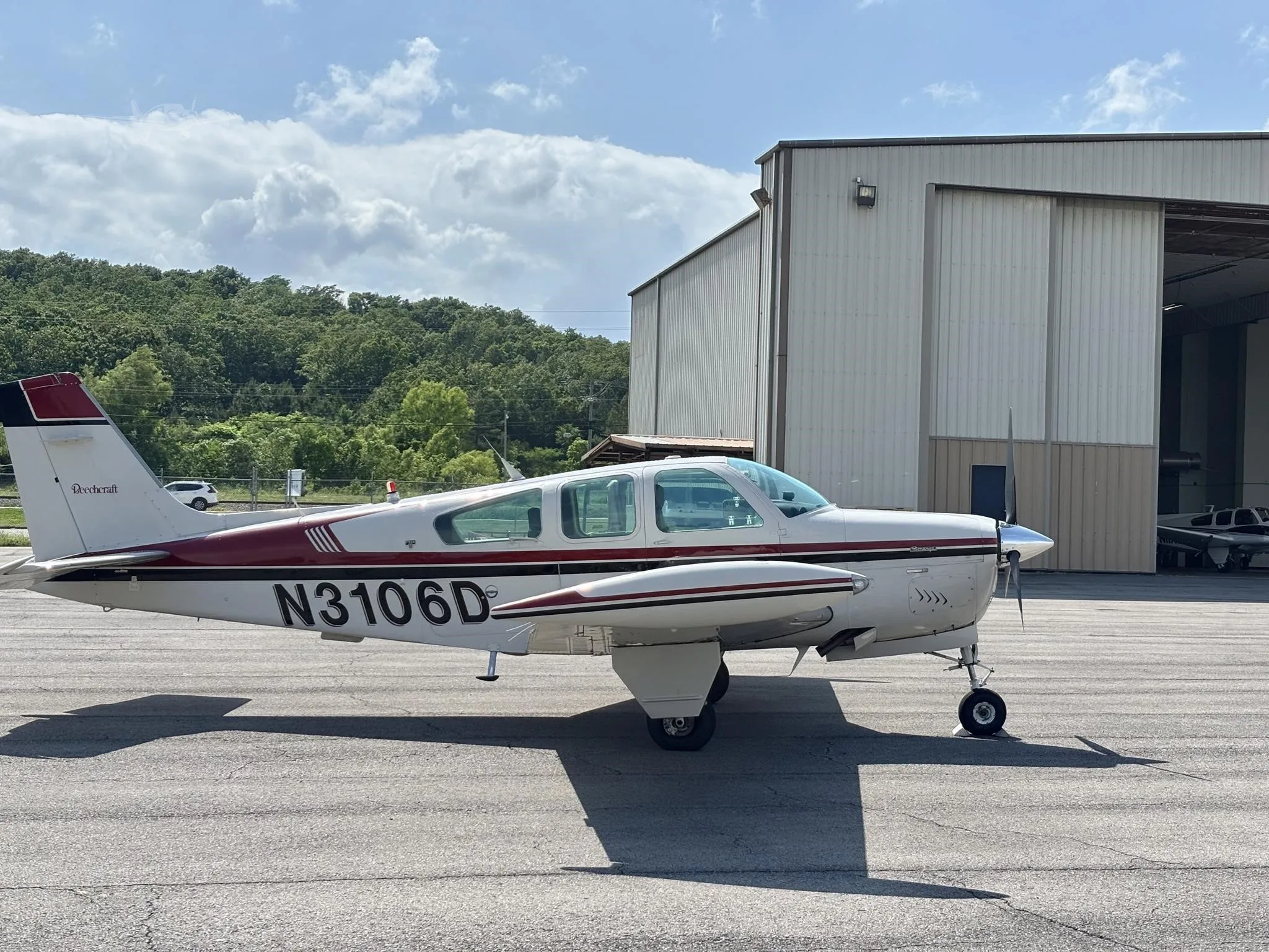 Exterior view of a 1988 BEECHCRAFT F33A BONANZA, N3106D.