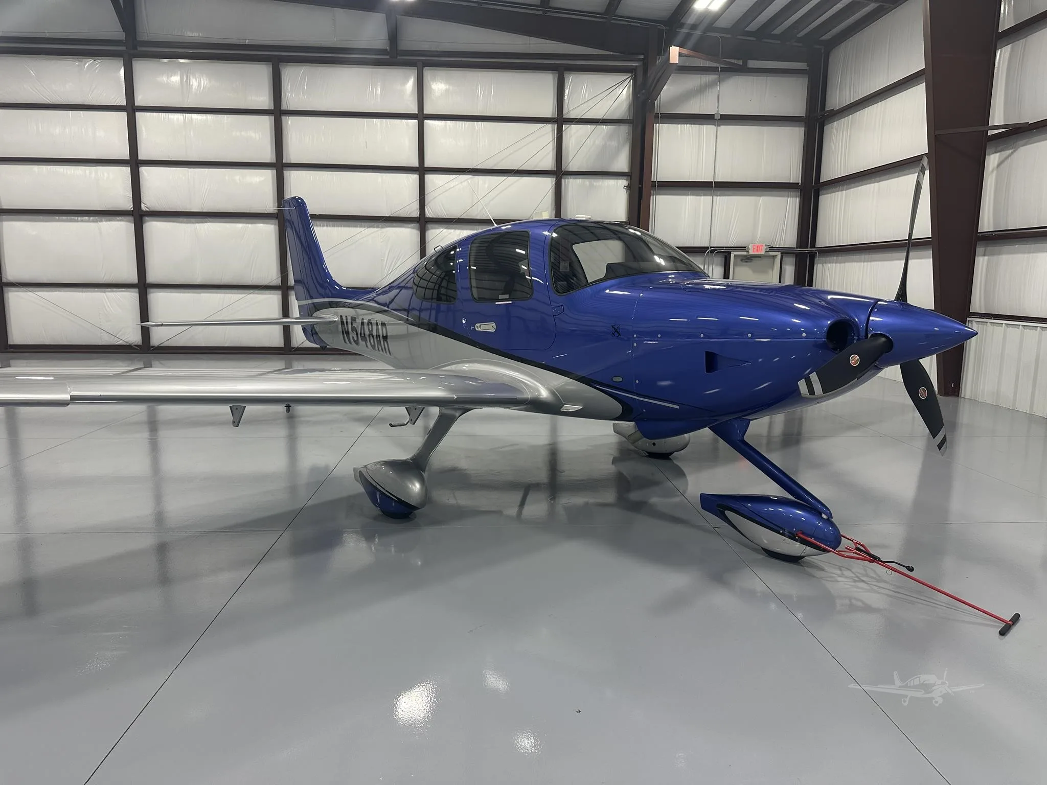 Exterior view of a 2025 CIRRUS SR20-G7, N548AR.