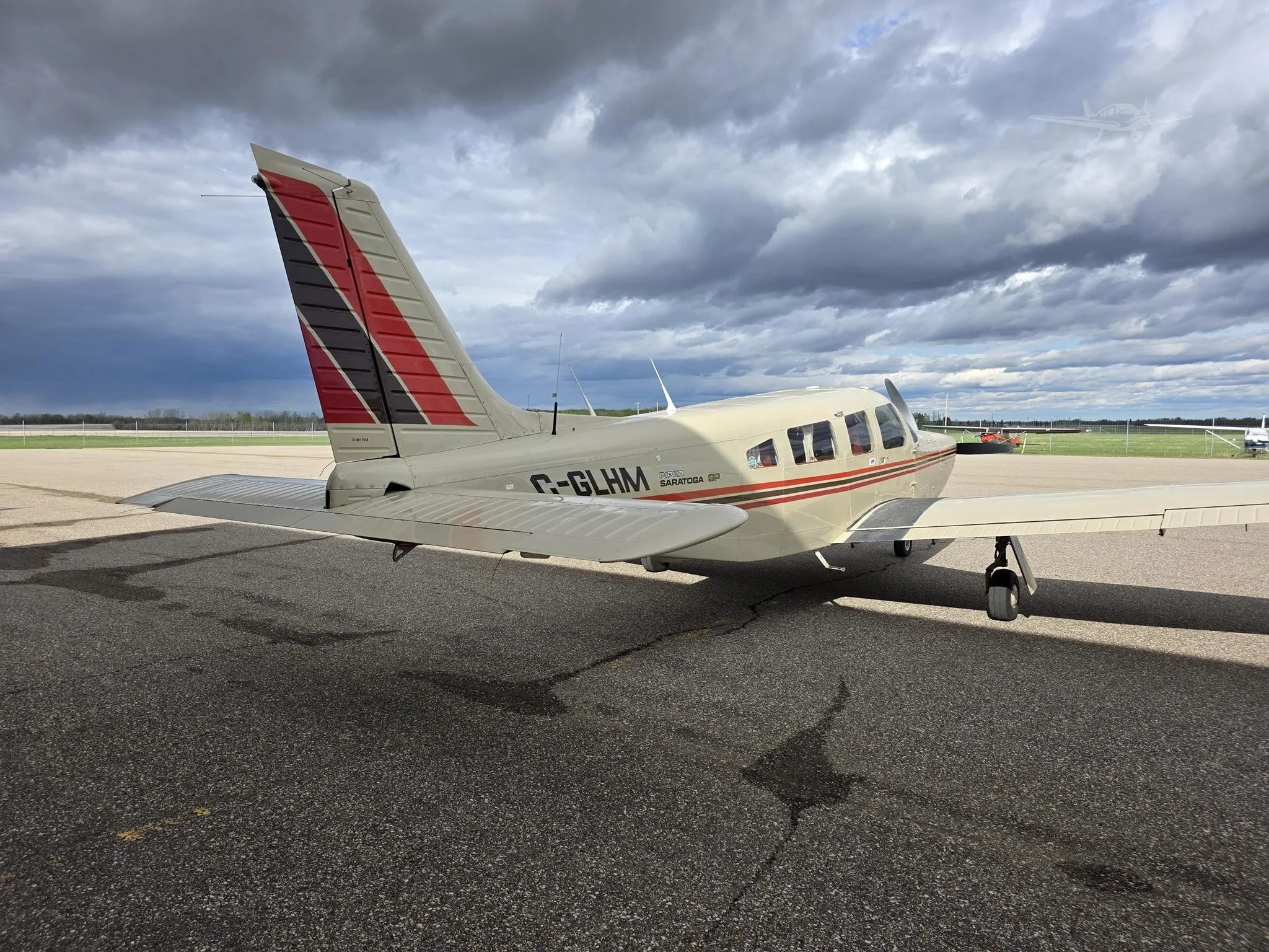 Exterior view of a 1980 PIPER SARATOGA SP, C-GLHM.