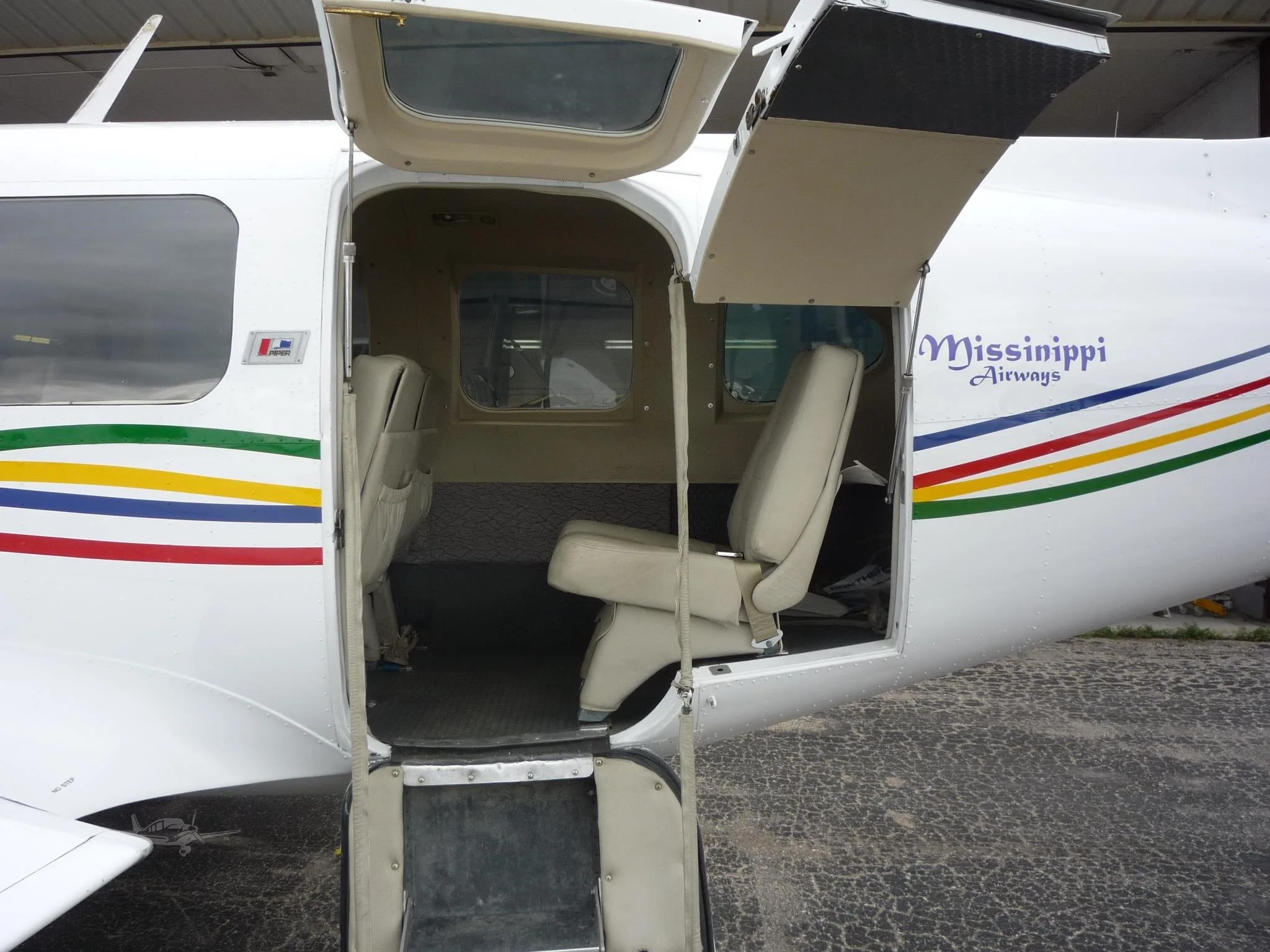 Exterior view of a 1977 PIPER NAVAJO CHIEFTAIN, C-GADW.