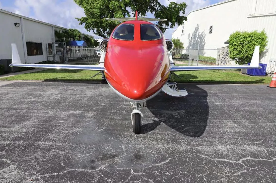 Exterior view of a 2016 HONDA JET APMG, N71TS.
