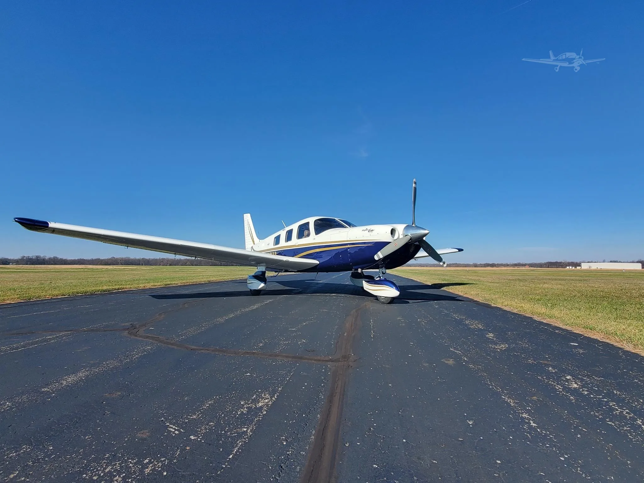 Exterior view of a 2004 PIPER 6XT, N423BM.
