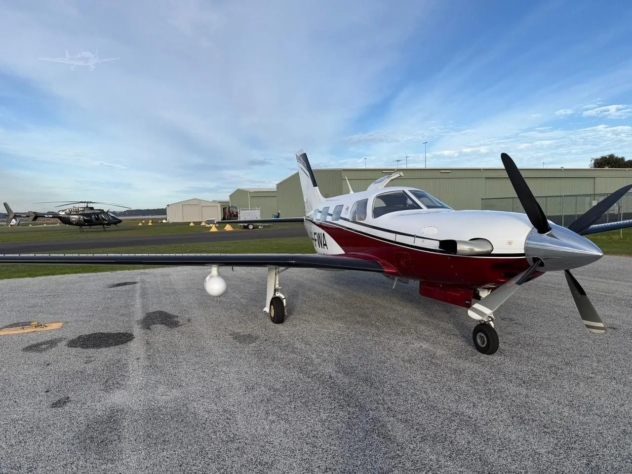 Exterior view of a 2013 PIPER MERIDIAN, VH-FWA.