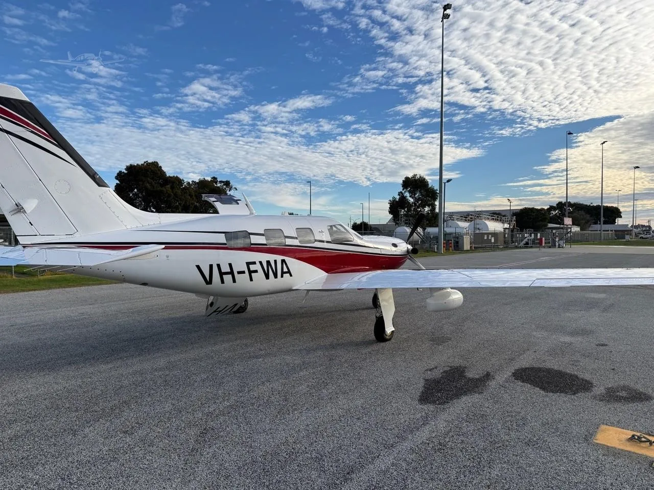 Exterior view of a 2013 PIPER MERIDIAN, VH-FWA.