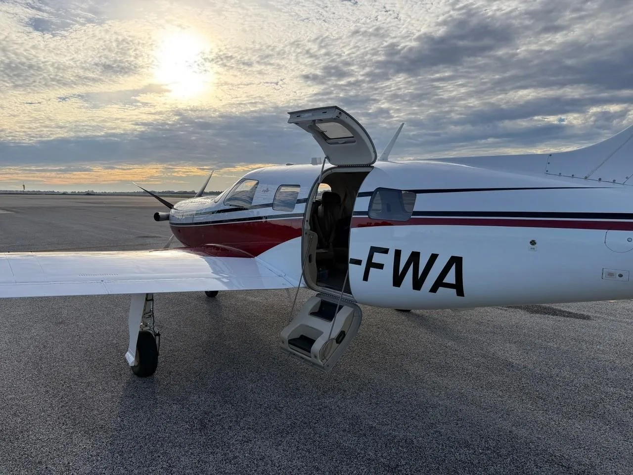 Exterior view of a 2013 PIPER MERIDIAN, VH-FWA.