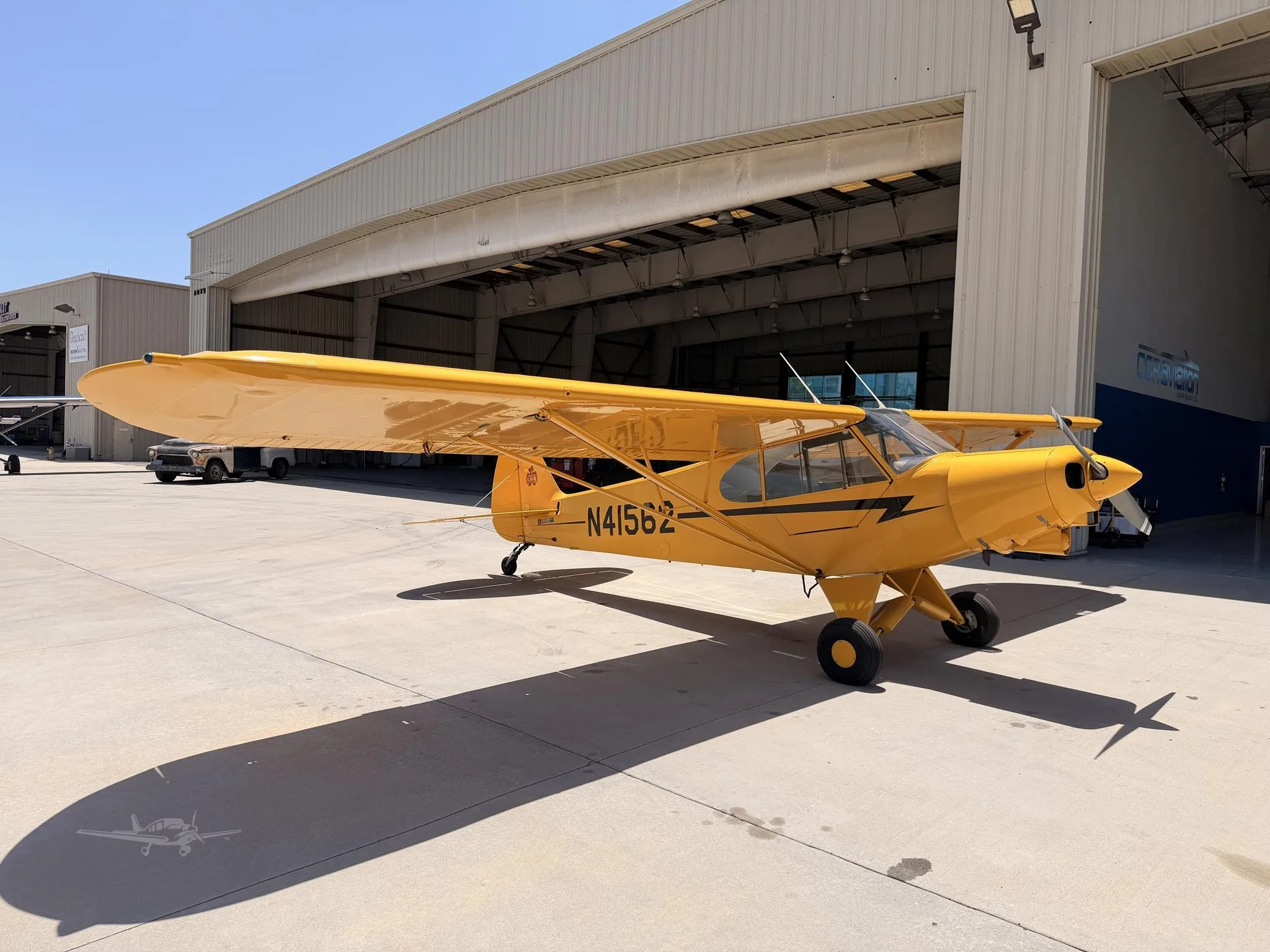 Exterior view of a 1990 PIPER SUPER CUB, N41562.