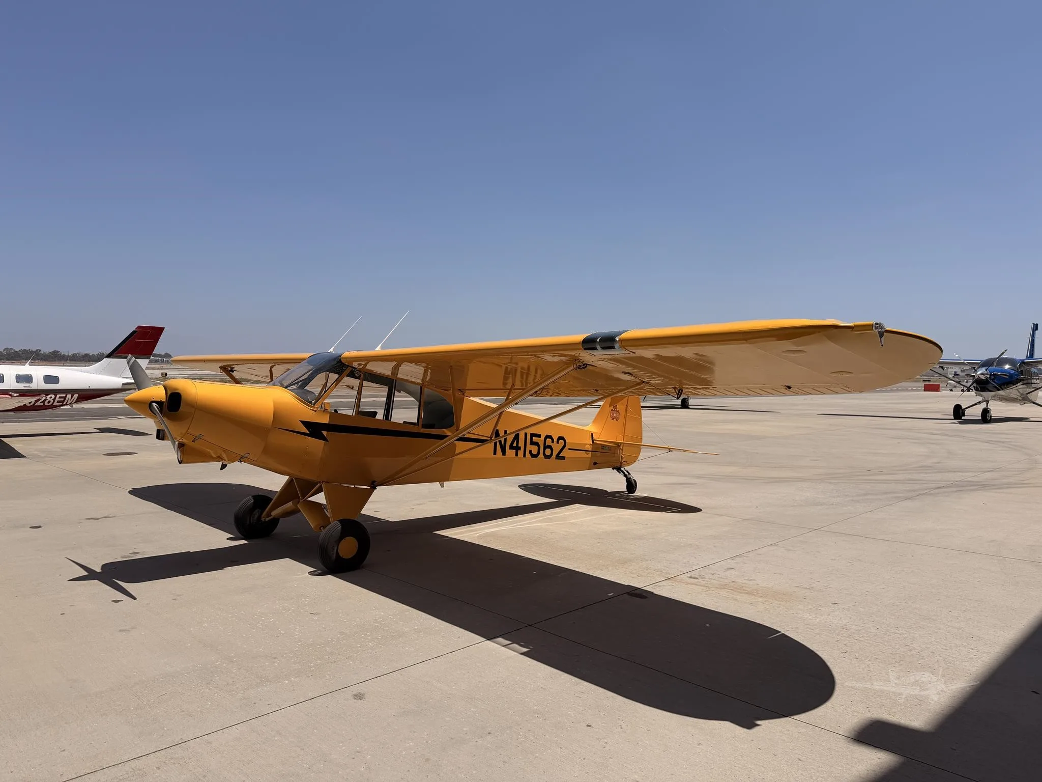 Exterior view of a 1990 PIPER SUPER CUB, N41562.