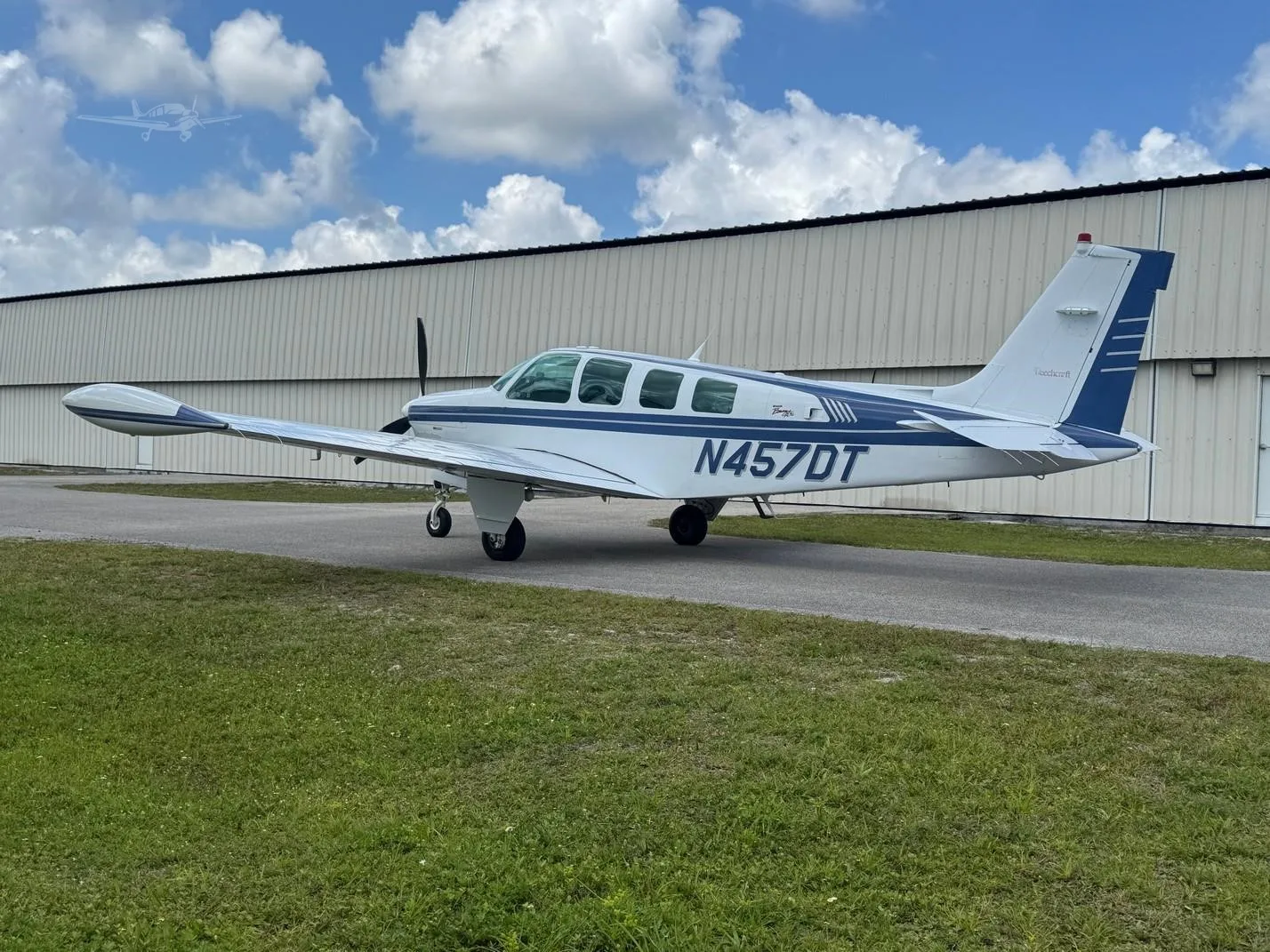 Exterior view of a 1997 BEECHCRAFT A36 BONANZA, N457DT.