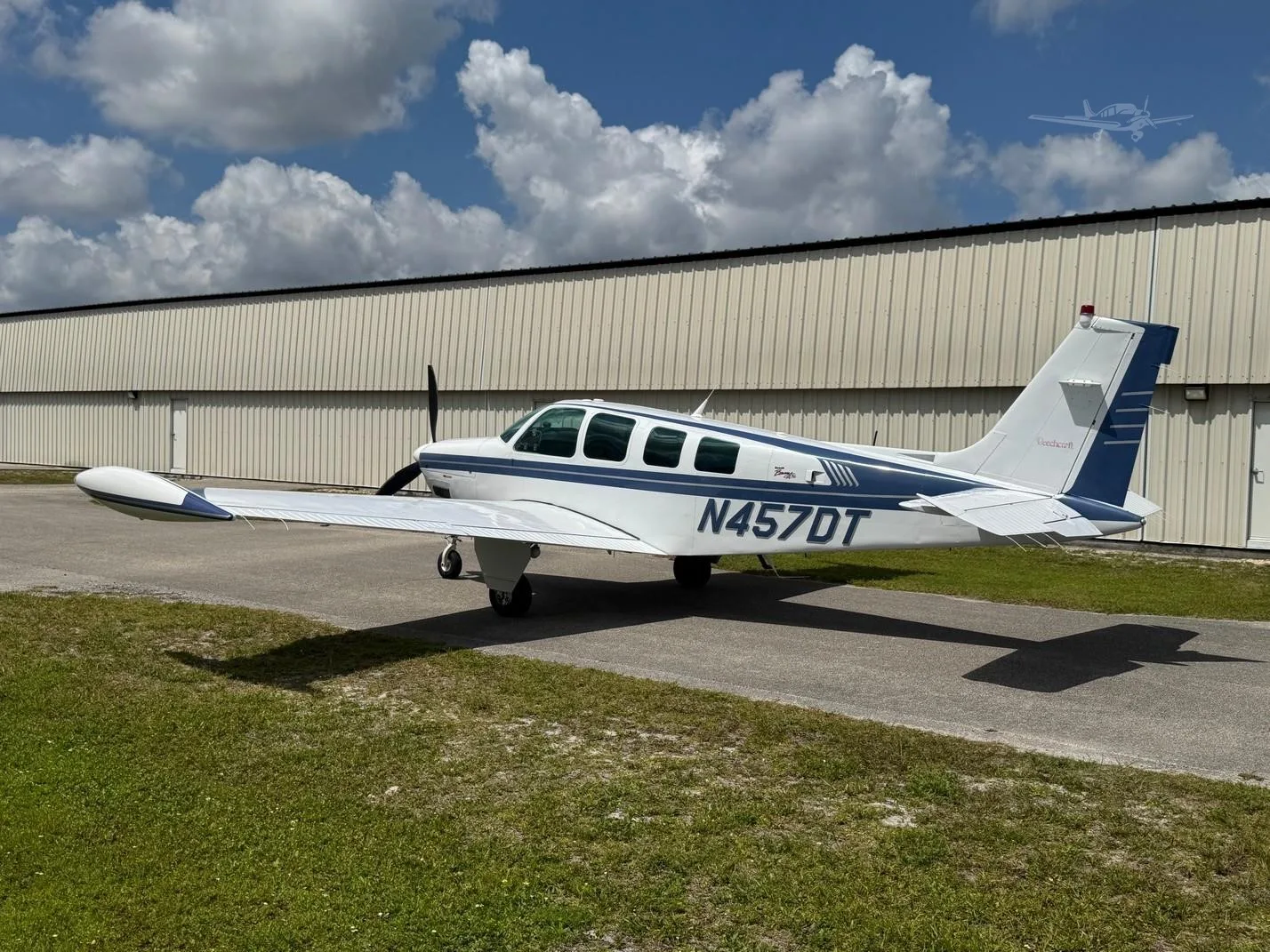 Exterior view of a 1997 BEECHCRAFT A36 BONANZA, N457DT.