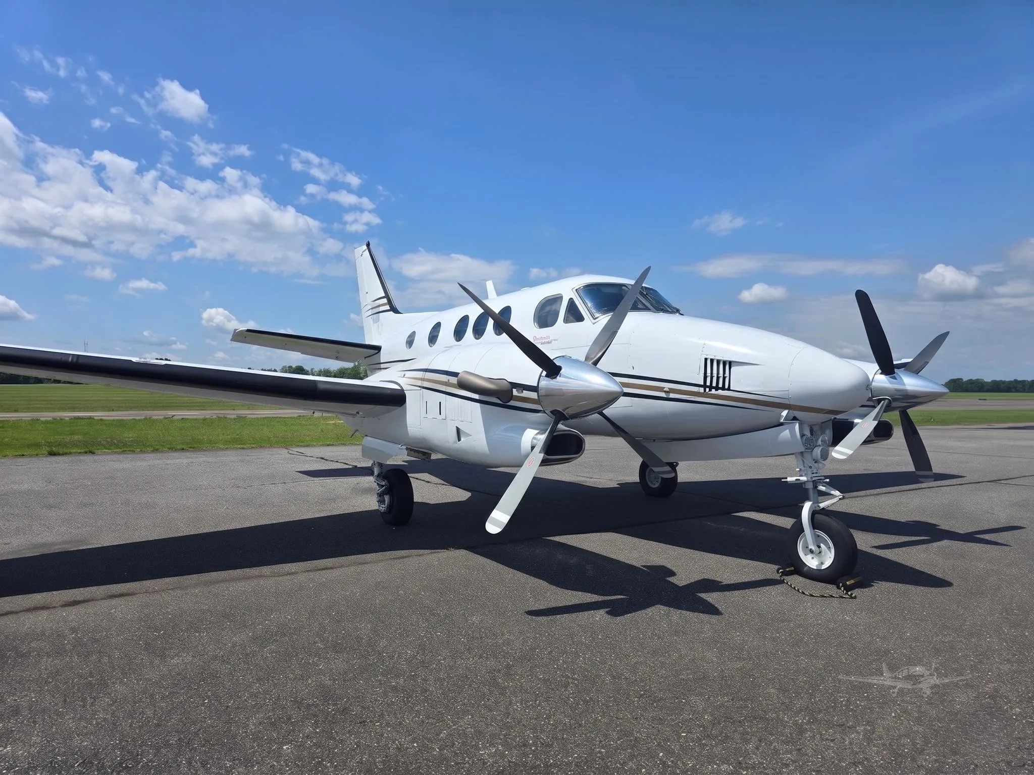 Exterior view of a 2008 BEECHCRAFT KING AIR C90GTI, N12WE.