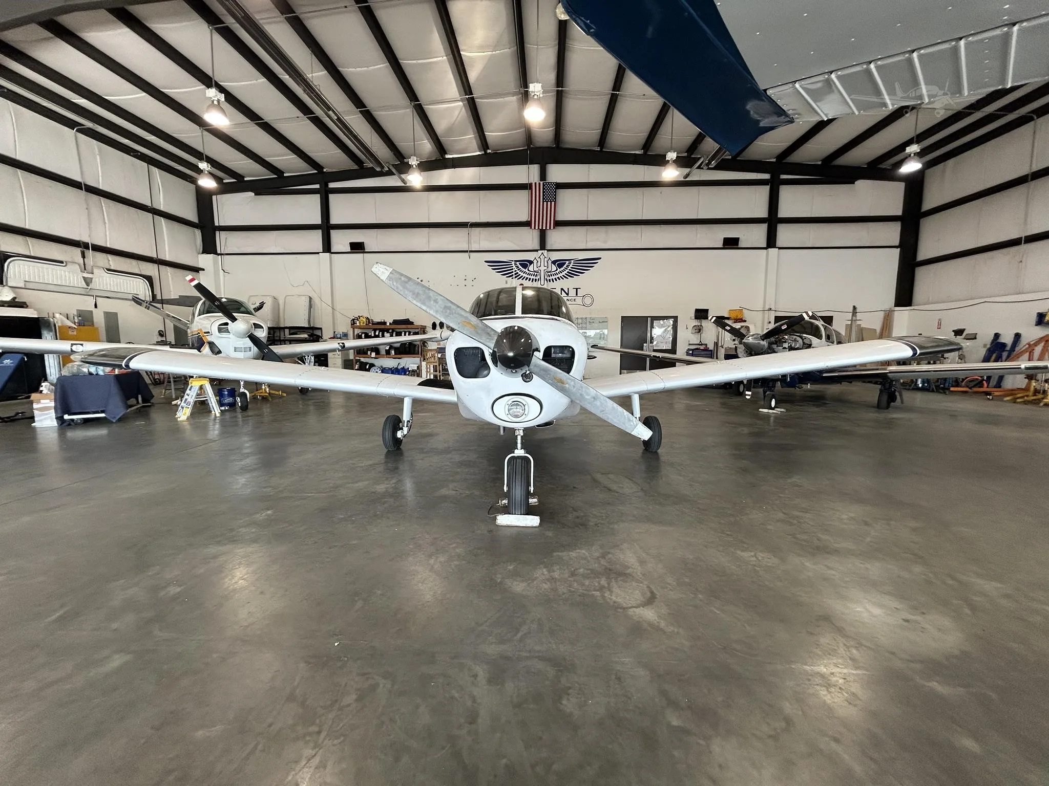 Exterior view of a 1967 PIPER CHEROKEE 140, N83BE.
