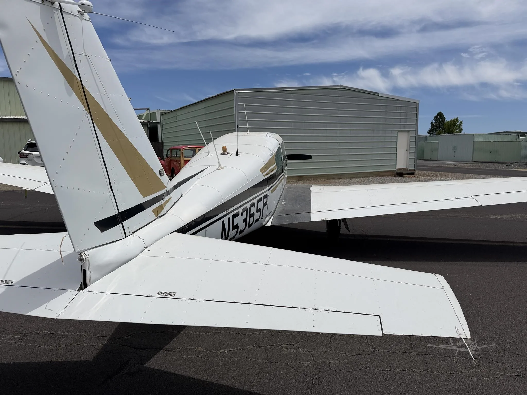 Exterior view of a 1959 PIPER COMANCHE 250, N5365P.