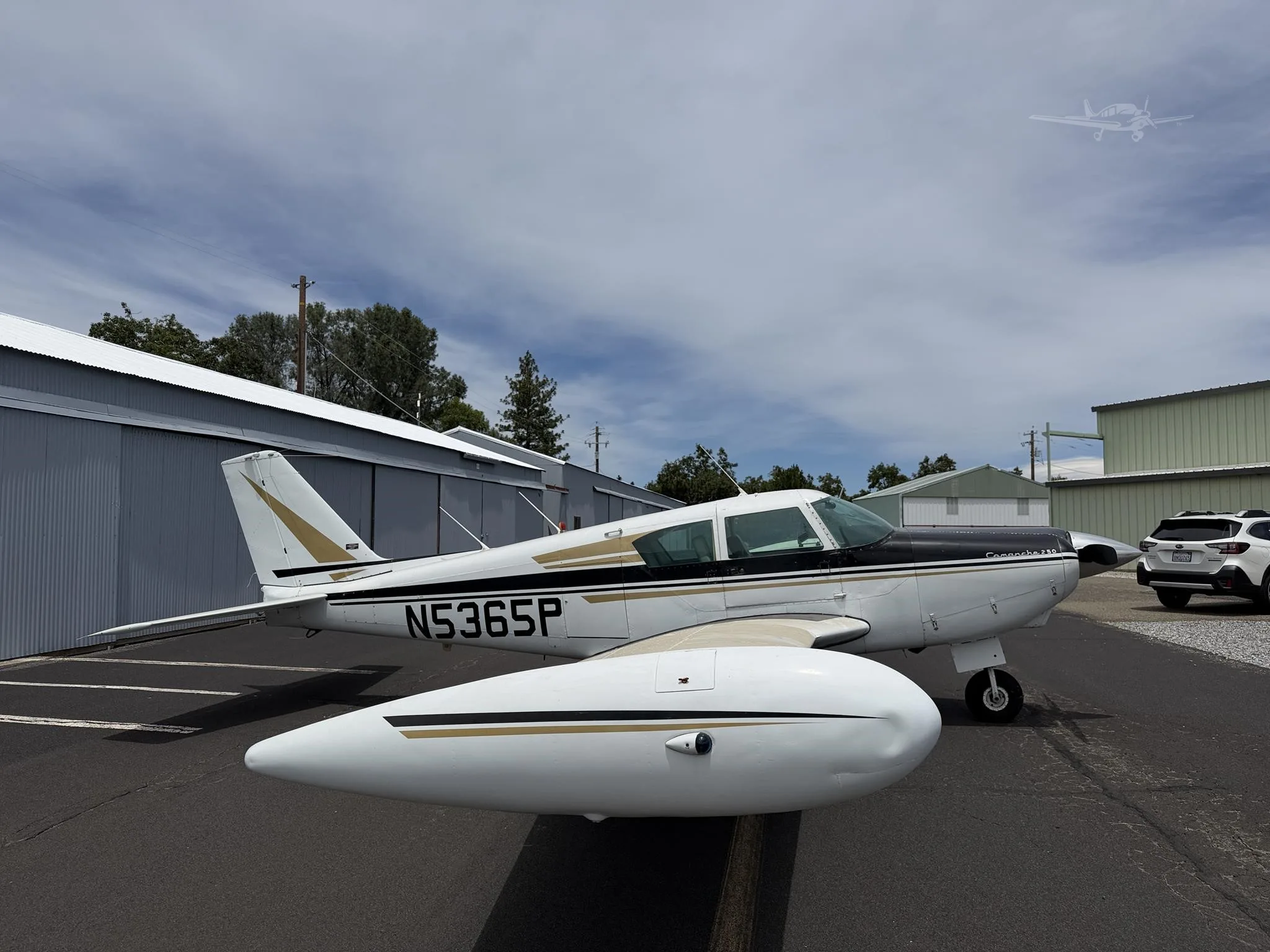 Exterior view of a 1959 PIPER COMANCHE 250, N5365P.