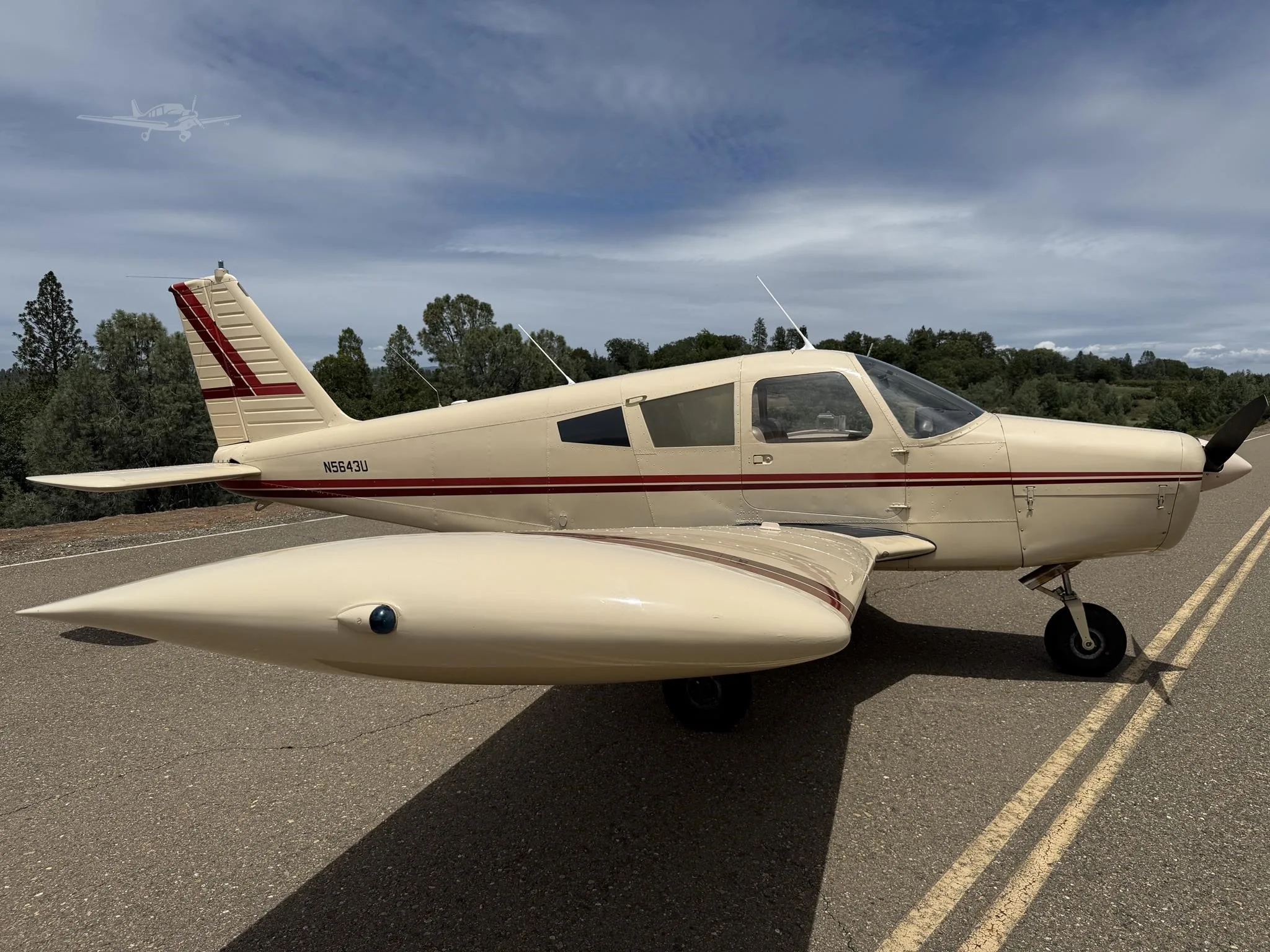 Exterior view of a 1969 PIPER CHEROKEE 140, N5643U.