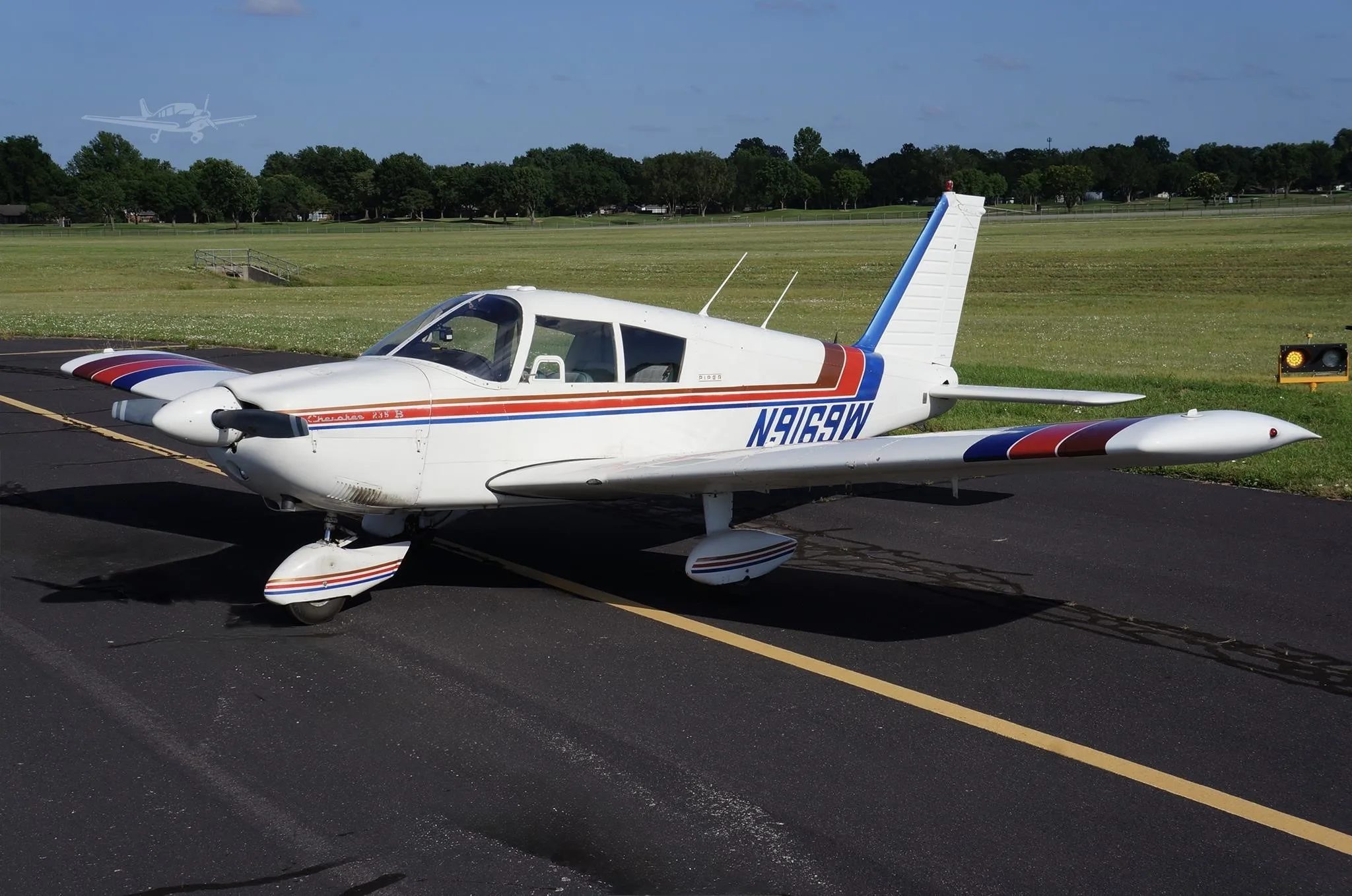 Exterior view of a 1967 PIPER CHEROKEE 235, N9169W.