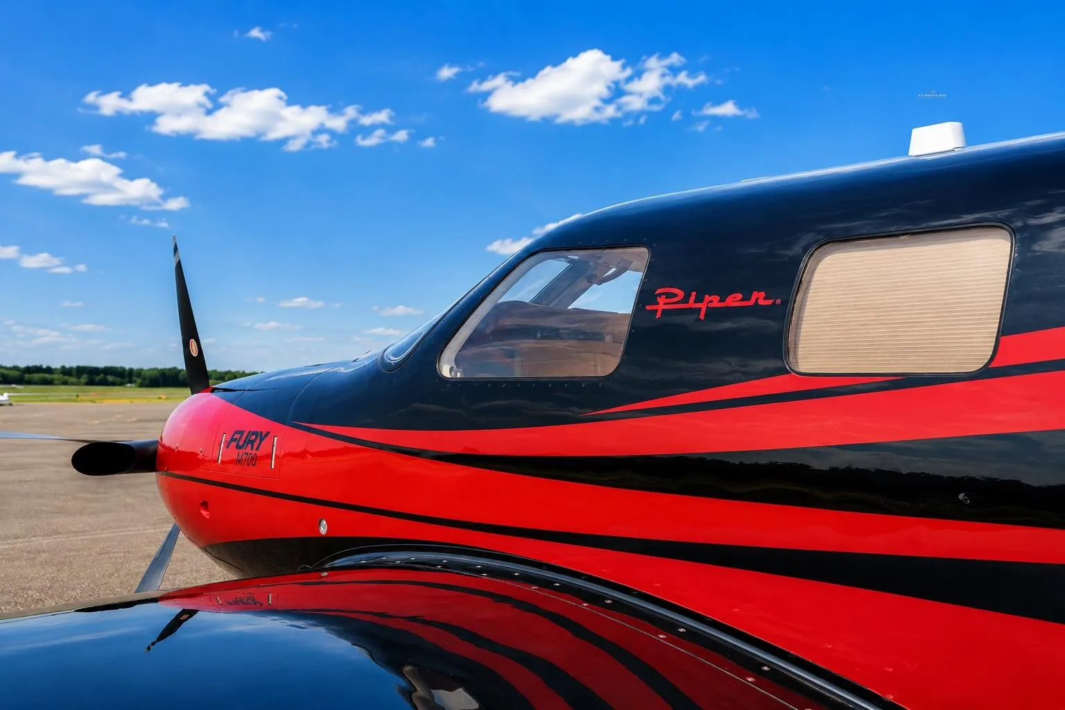 Exterior view of a 2026 PIPER M700, N33FG.