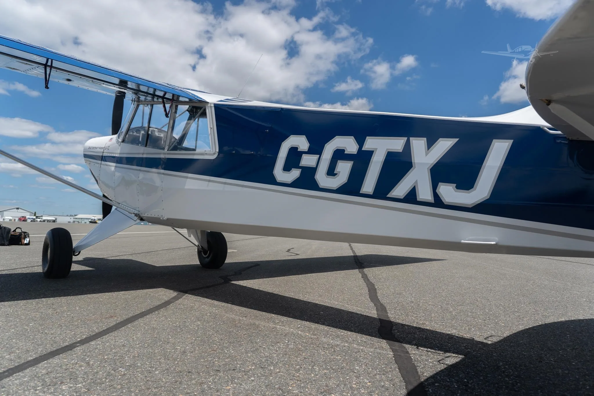 Exterior view of a 2010 AVIAT HUSKY A-1C-180, C-GTXJ.