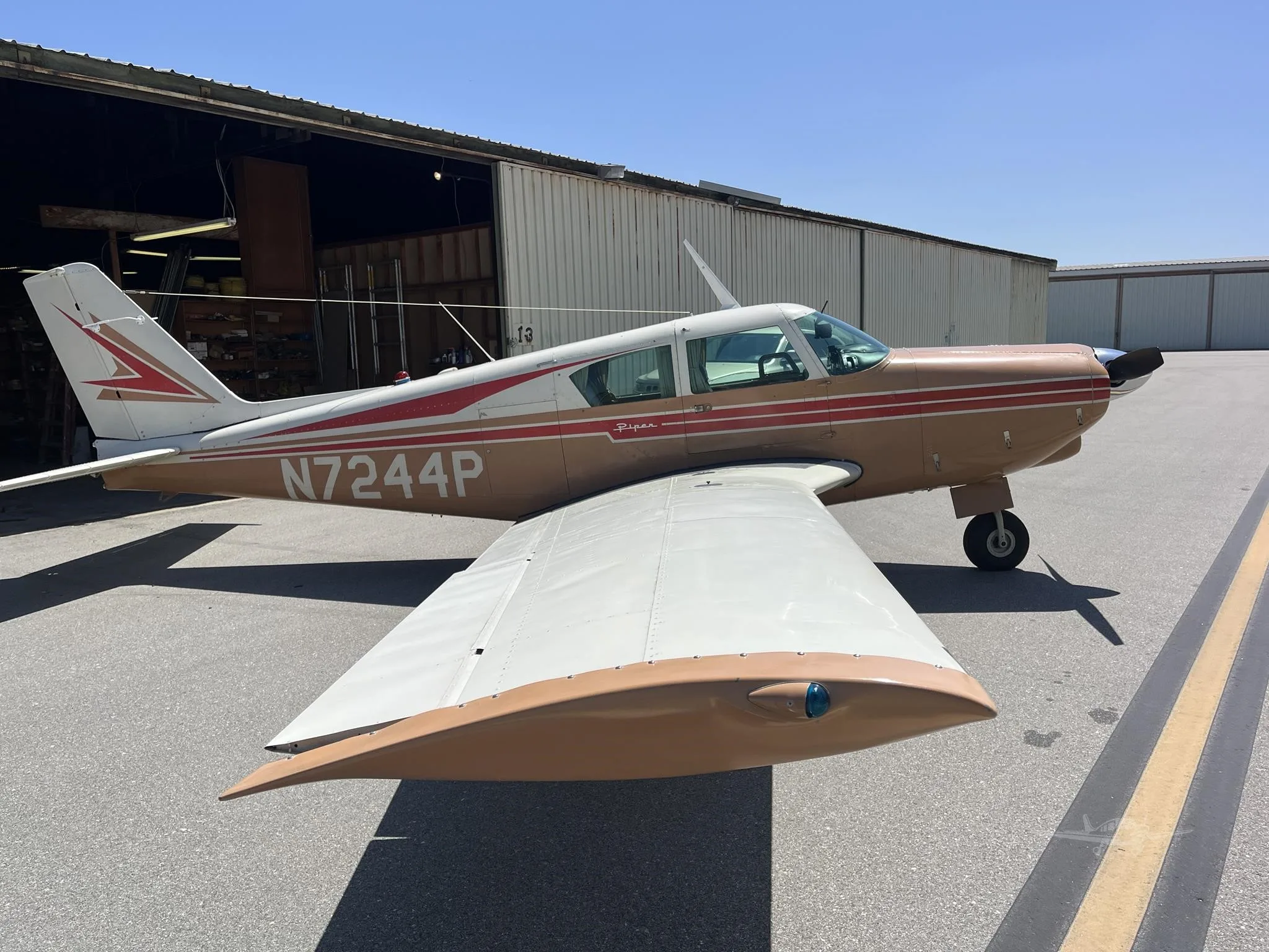 Exterior view of a 1961 PIPER COMANCHE 250, N7244P.