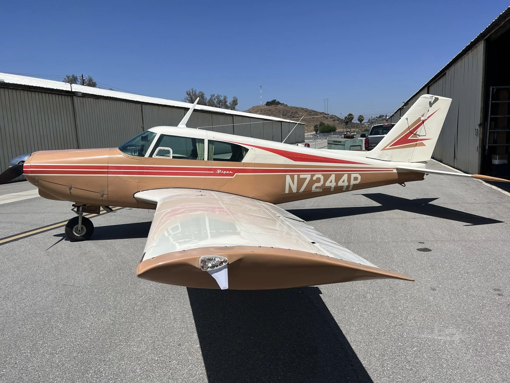 Exterior view of a 1961 PIPER COMANCHE 250, N7244P.
