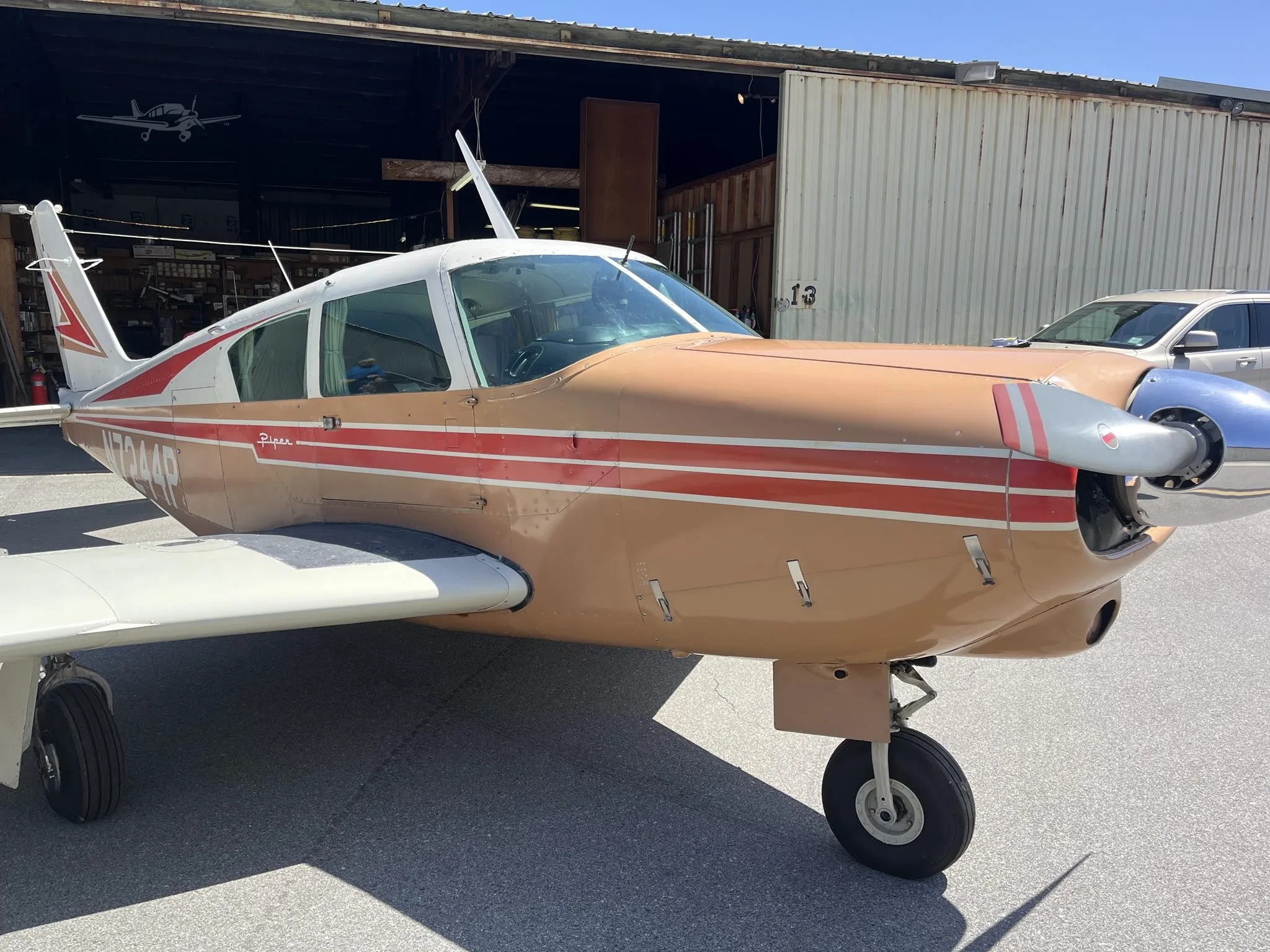 Exterior view of a 1961 PIPER COMANCHE 250, N7244P.