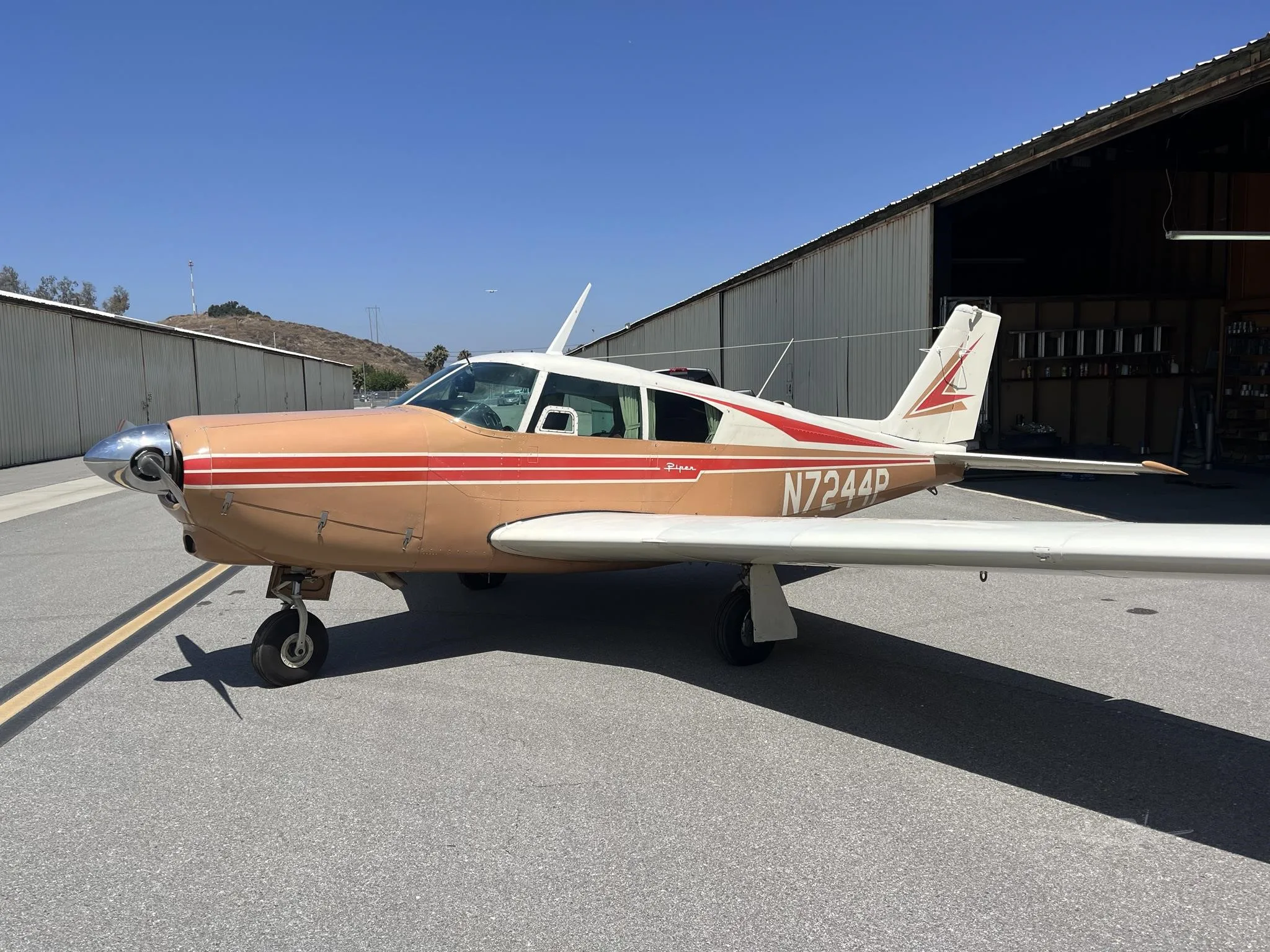 Exterior view of a 1961 PIPER COMANCHE 250, N7244P.