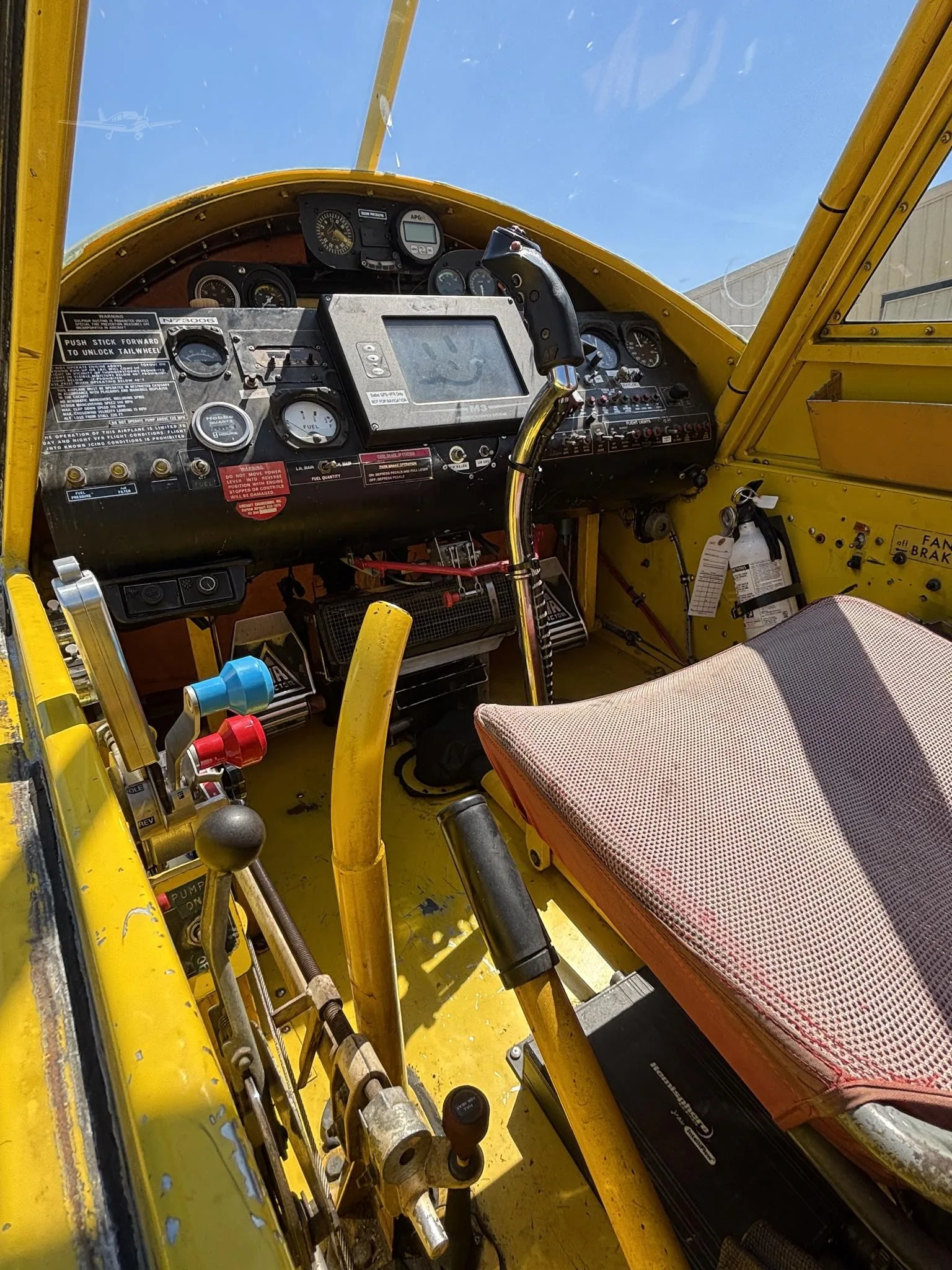 Cockpit and instrument panel of a 1985 AIR TRACTOR AT-400A.