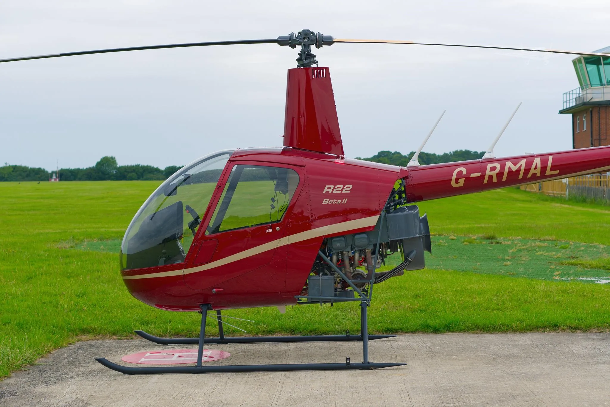 Exterior view of a 2026 ROBINSON R22 BETA II, G-RMAL.