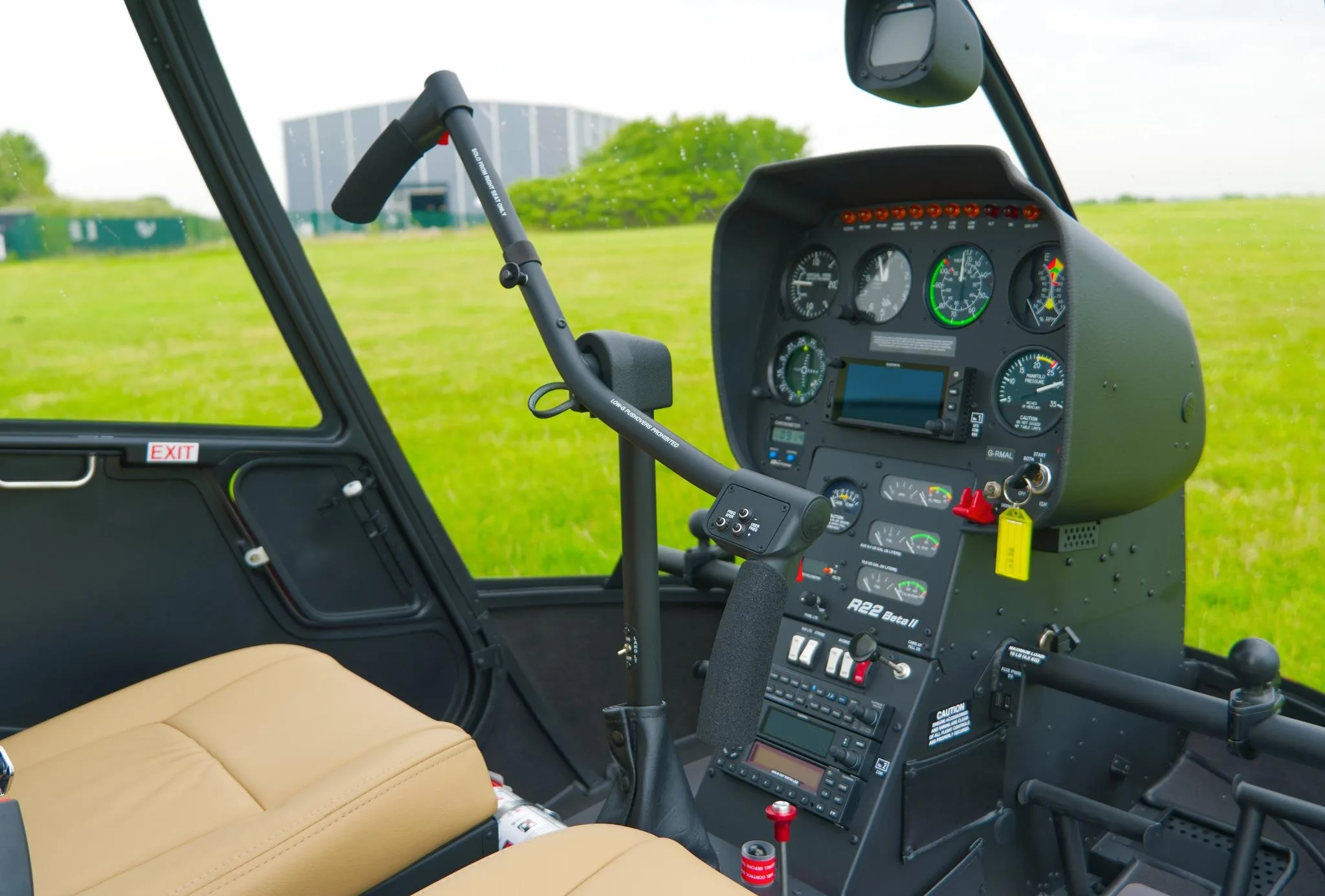 Cockpit and instrument panel of a 2026 ROBINSON R22 BETA II.