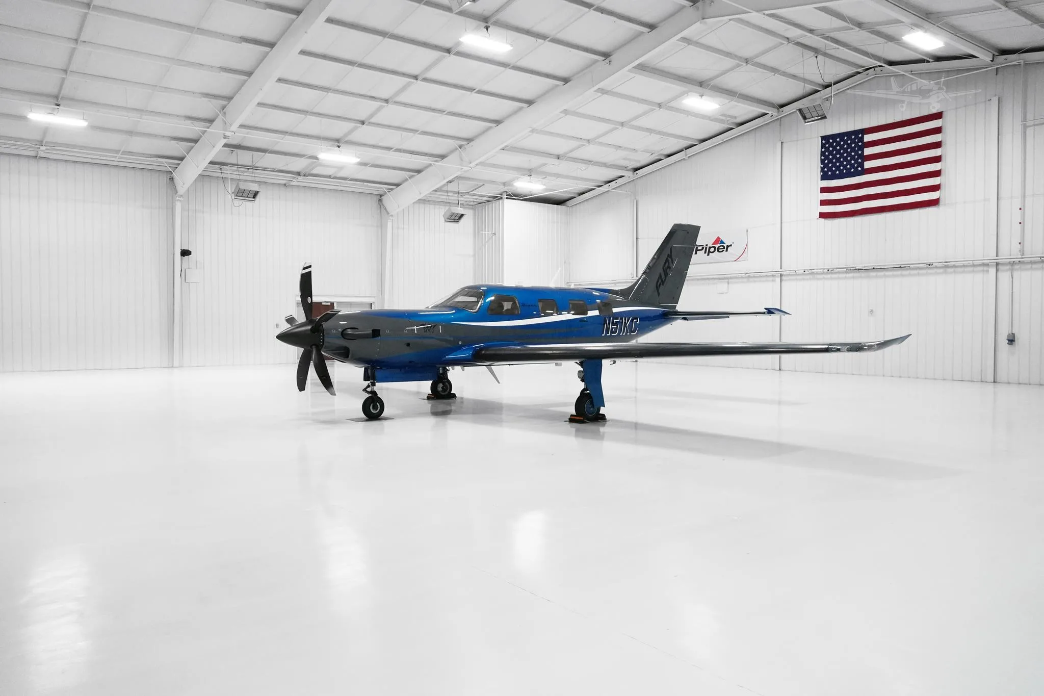 Exterior view of a 2026 PIPER M700, N51KC.