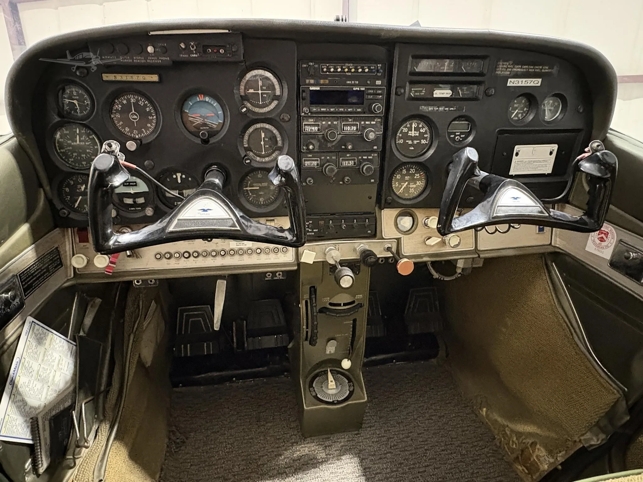 Cockpit and instrument panel of a 1967 CESSNA 182 SKYLANE.