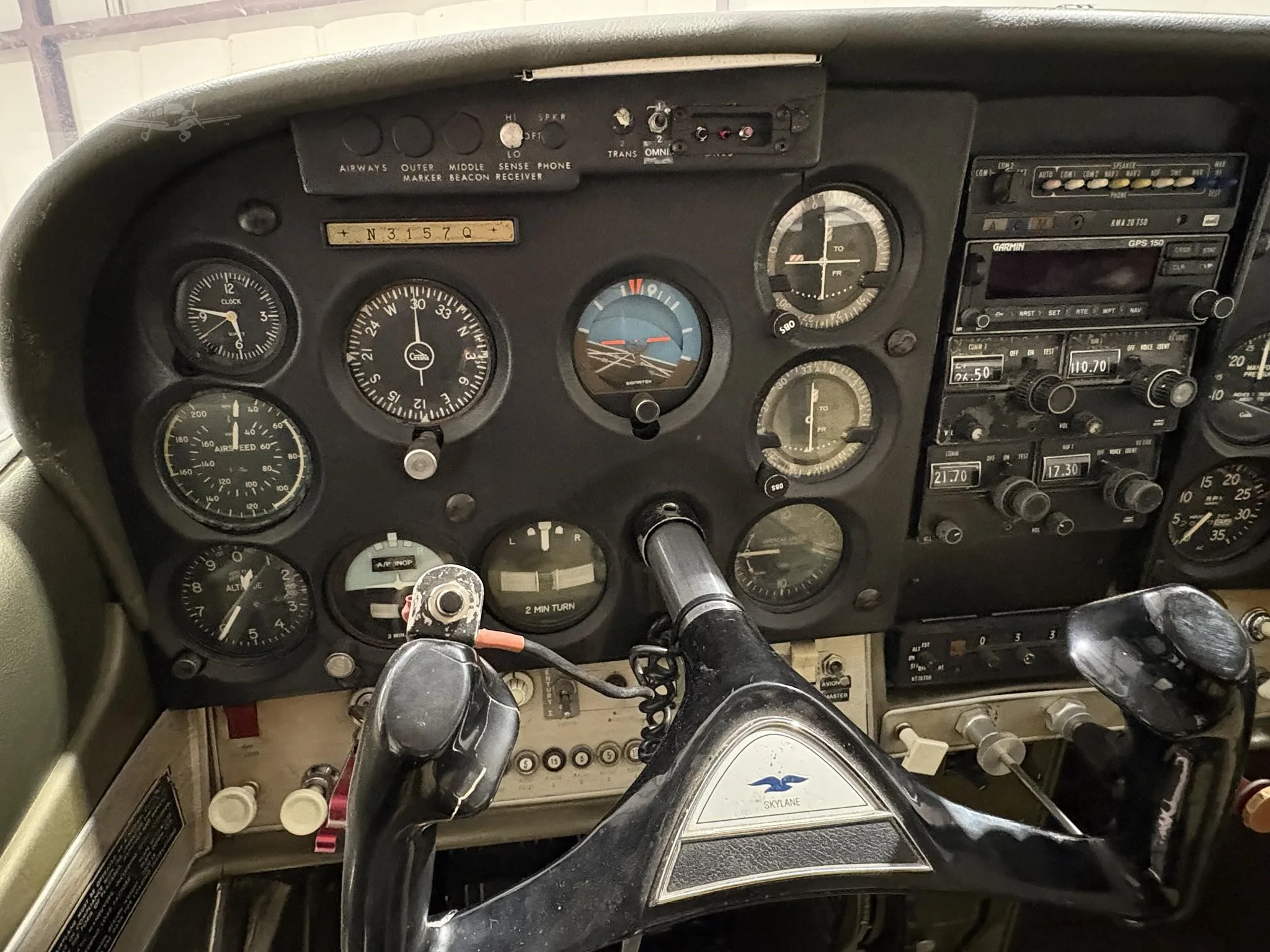 Cockpit and instrument panel of a 1967 CESSNA 182 SKYLANE.