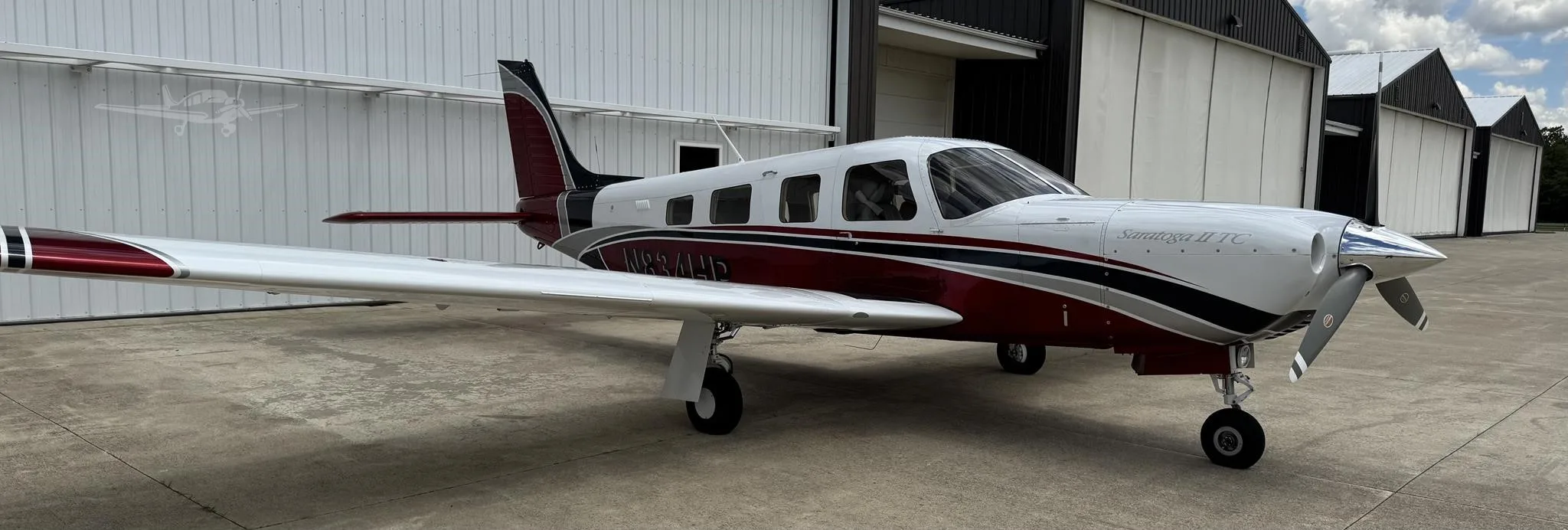 Exterior view of a 2006 PIPER SARATOGA II TC, N834HP.