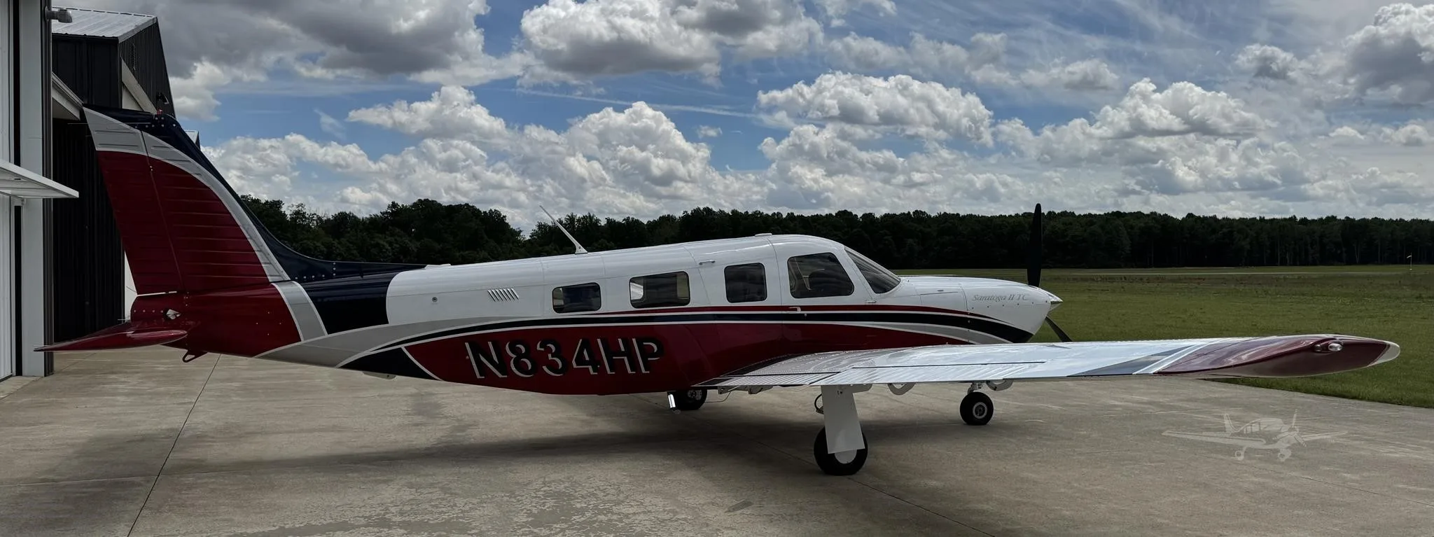 Exterior view of a 2006 PIPER SARATOGA II TC, N834HP.