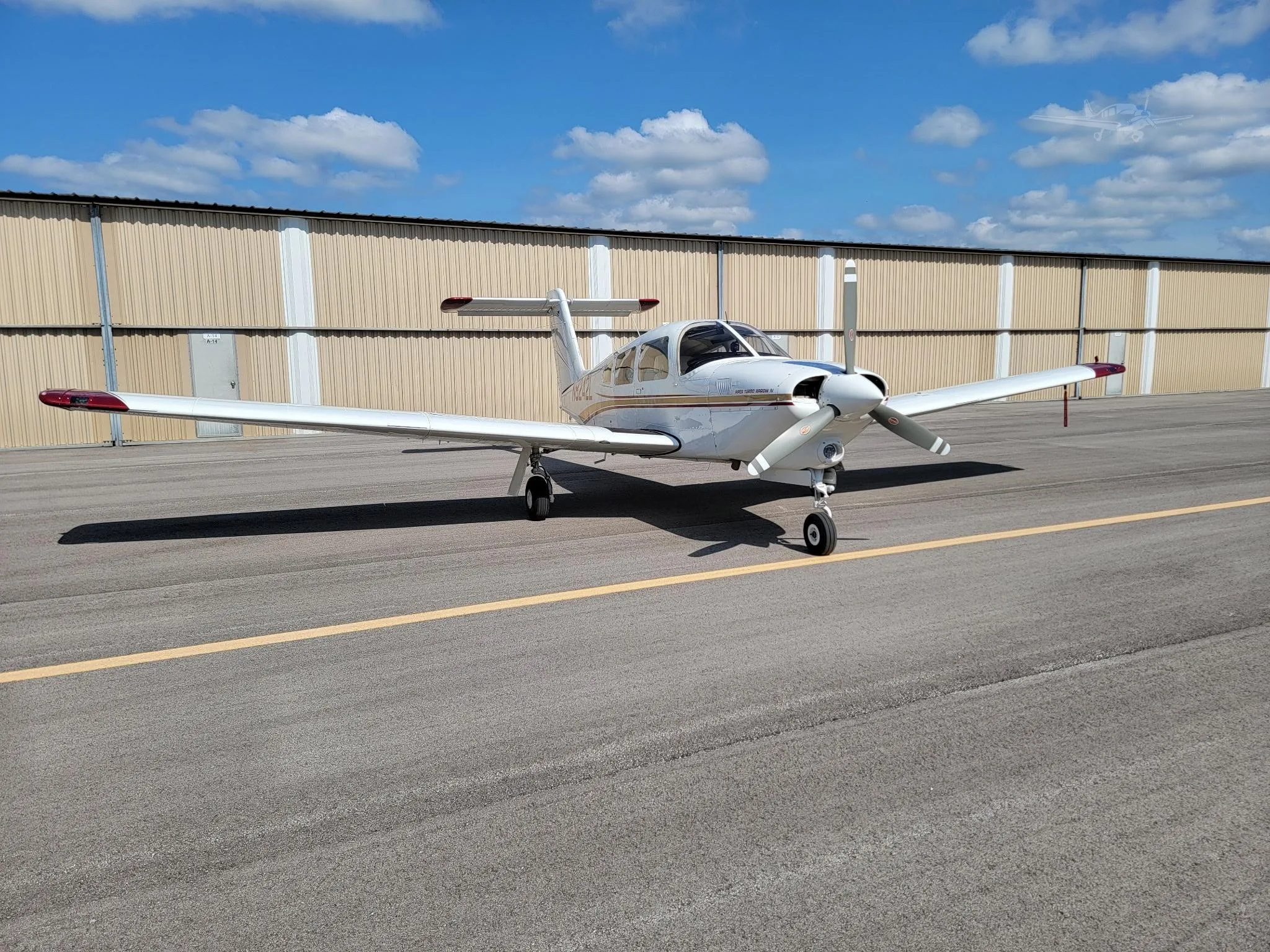 Exterior view of a 1980 PIPER TURBO ARROW IV, N8242L.