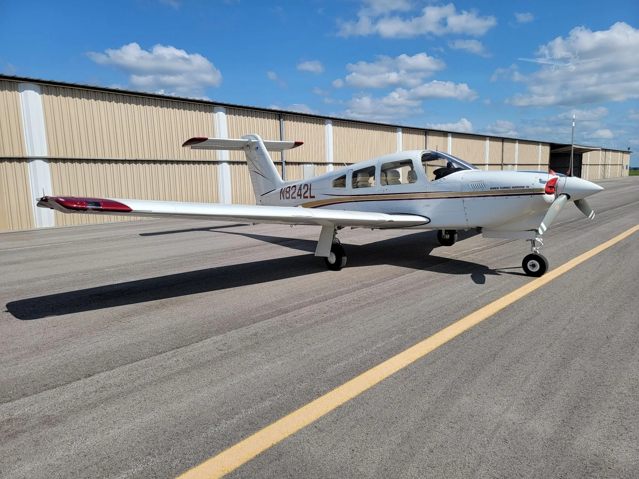 Exterior view of a 1980 PIPER TURBO ARROW IV, N8242L.