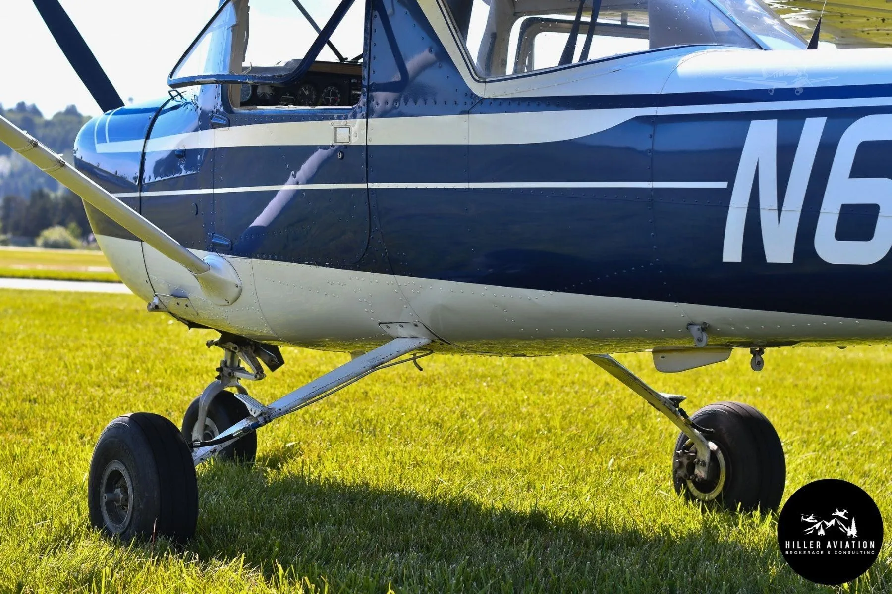 Exterior view of a 1971 CESSNA 150, N6457G.