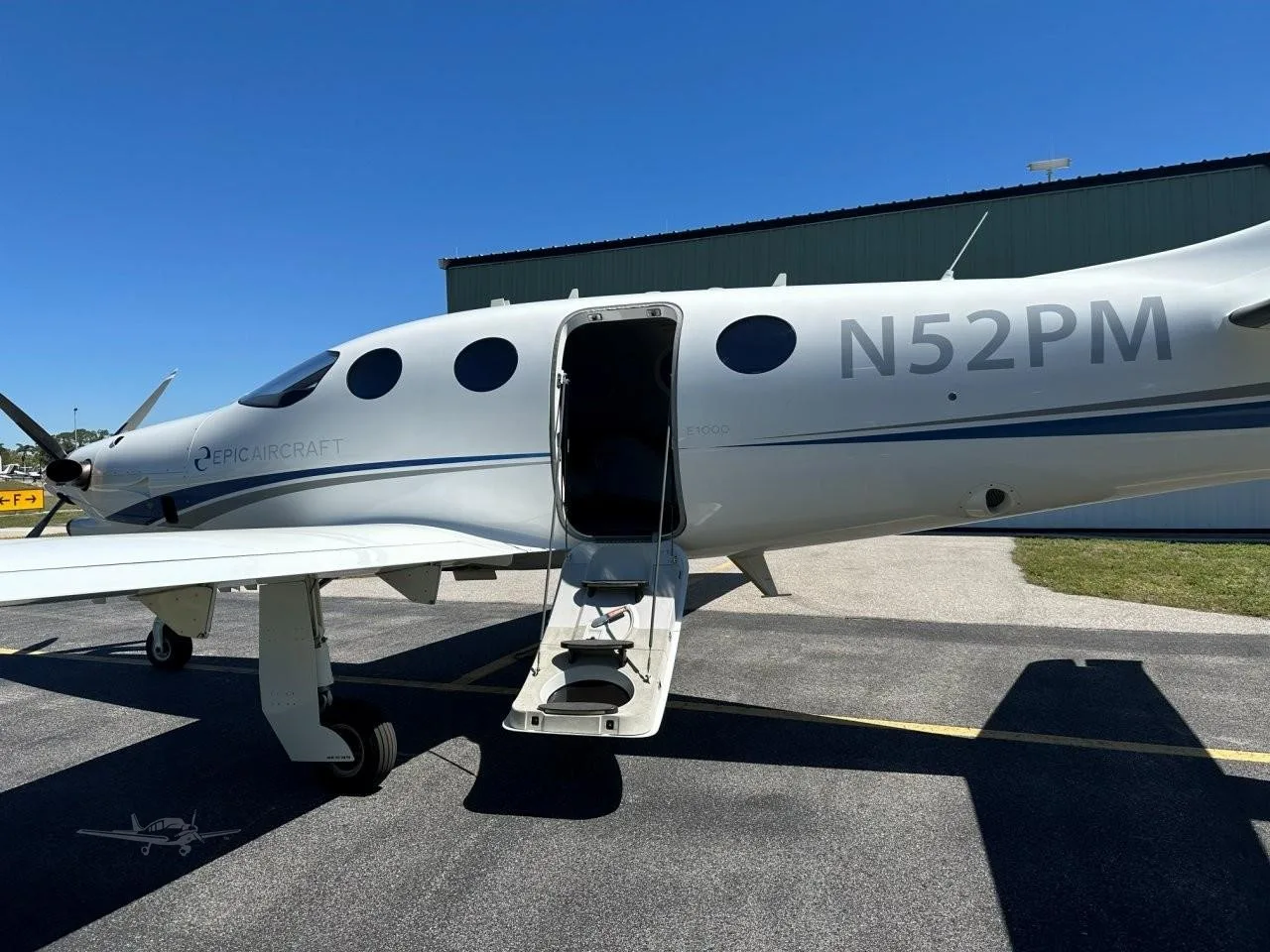 Exterior view of a 2020 EPIC E1000, N52PM.