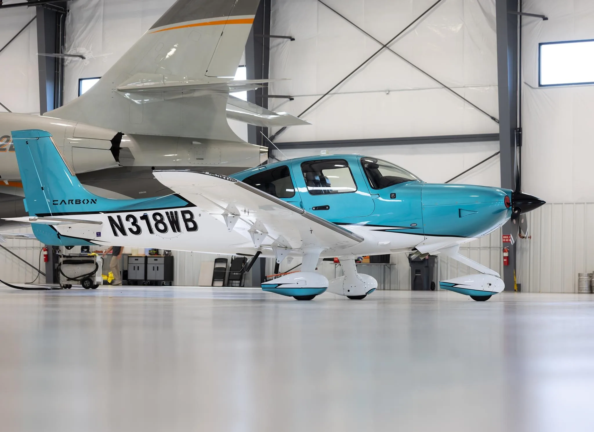 Exterior view of a 2023 CIRRUS SR22-G6, N318WB.