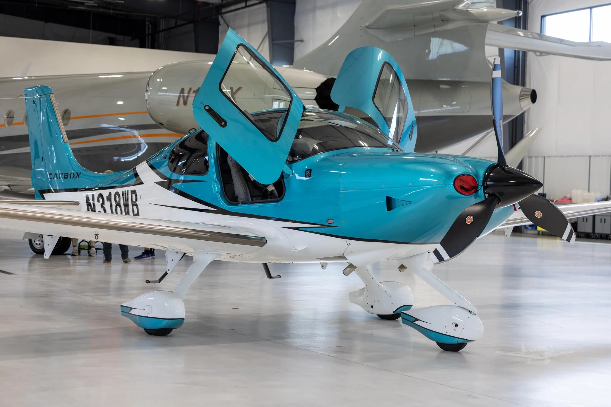 Exterior view of a 2023 CIRRUS SR22-G6, N318WB.