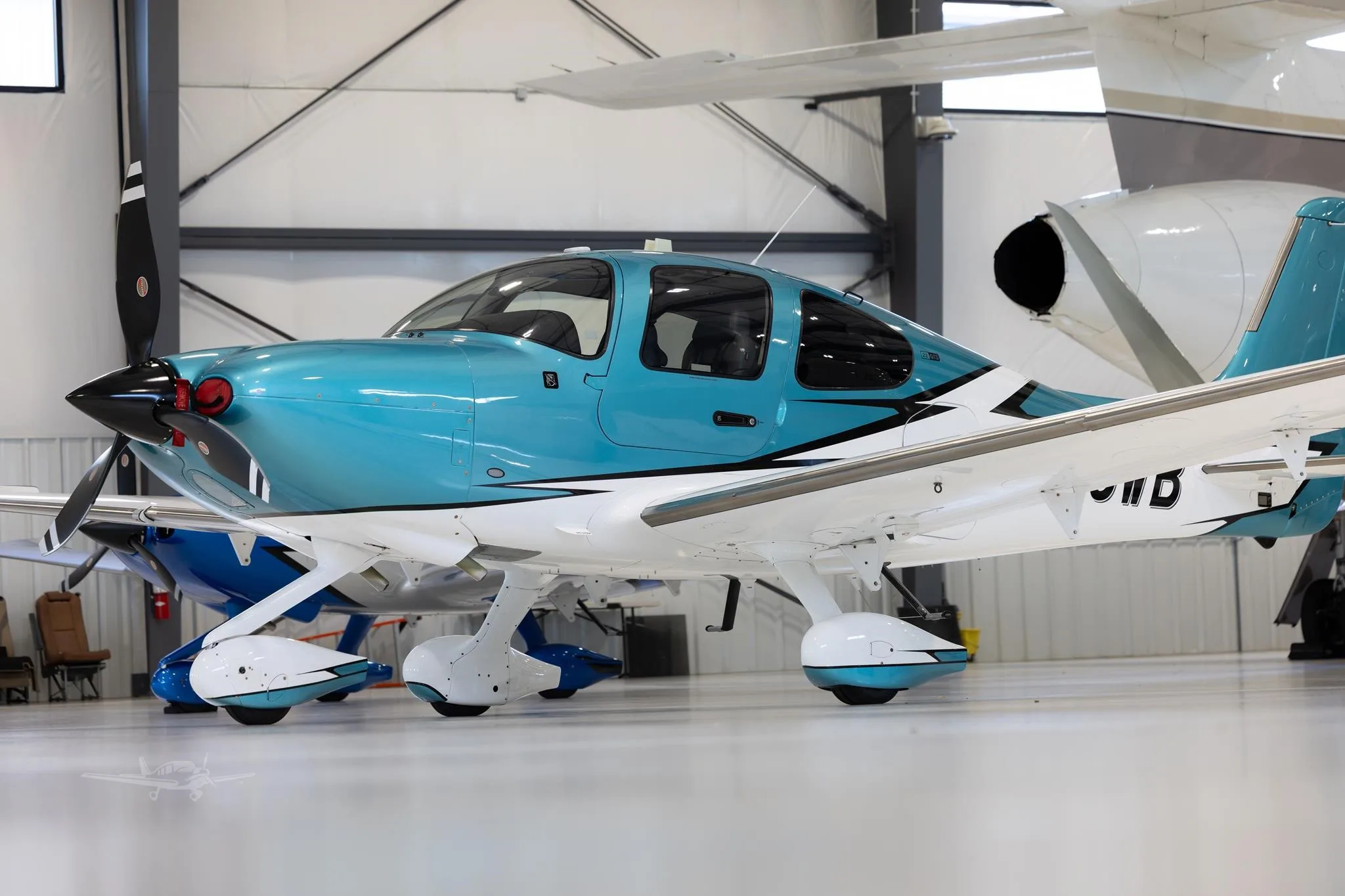 Exterior view of a 2023 CIRRUS SR22-G6, N318WB.
