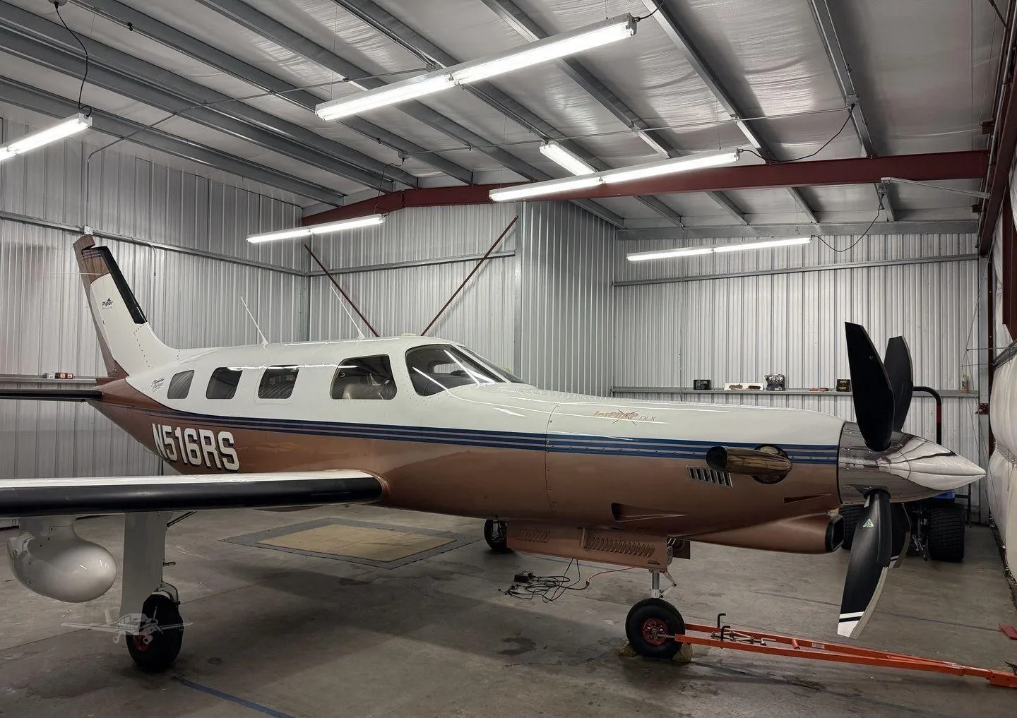 Exterior view of a 1999 PIPER JETPROP, N516RS.