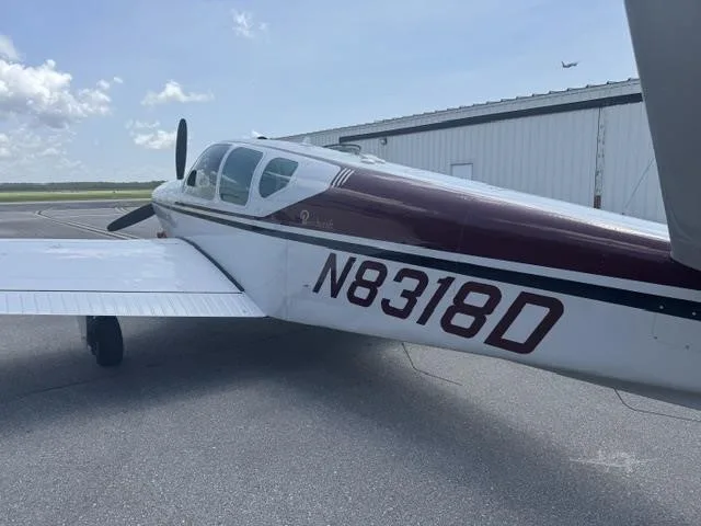 Exterior view of a 1958 BEECHCRAFT J35 BONANZA, N8318D.
