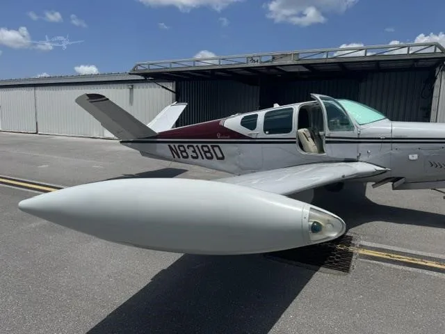 Exterior view of a 1958 BEECHCRAFT J35 BONANZA, N8318D.