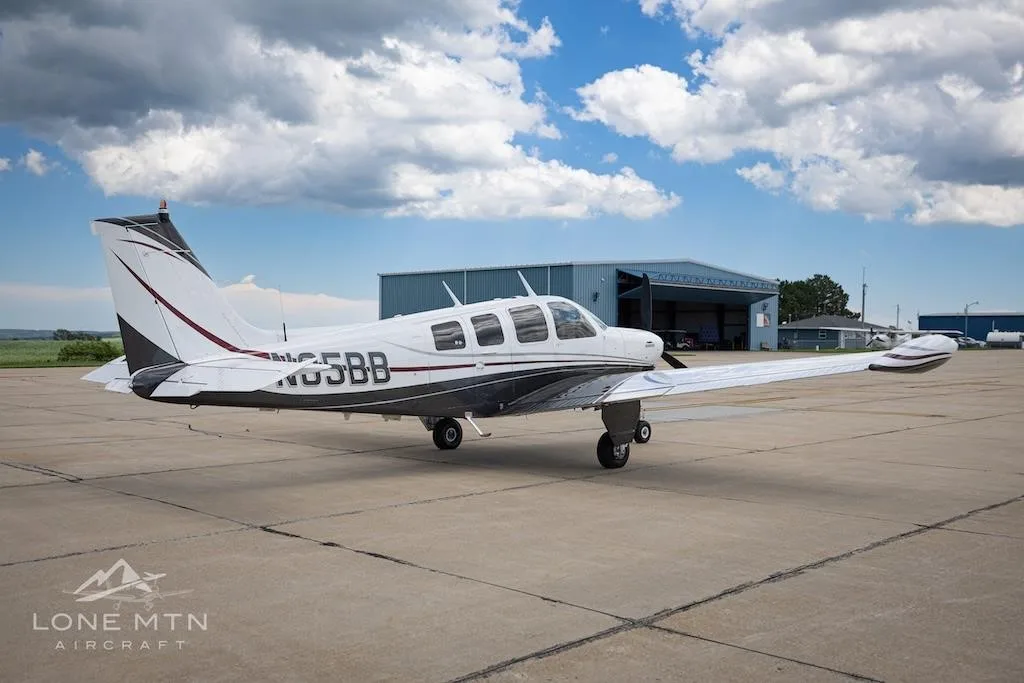 Exterior view of a 1973 BEECHCRAFT A36 BONANZA, N85BB.