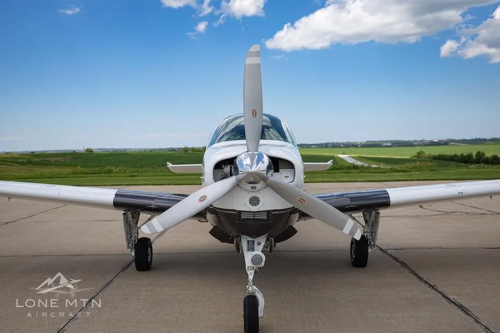 Exterior view of a 1973 BEECHCRAFT A36 BONANZA, N85BB.