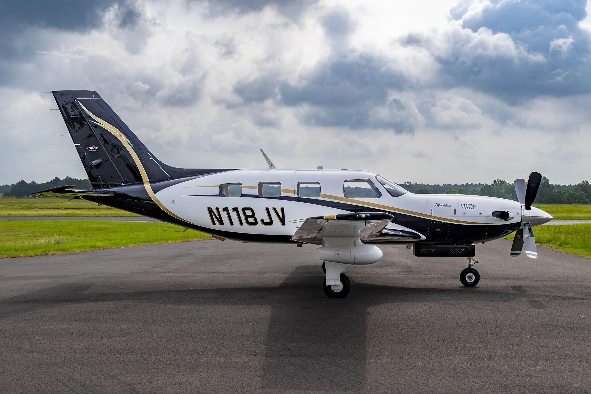 Exterior view of a 2006 PIPER MERIDIAN, N118JV.