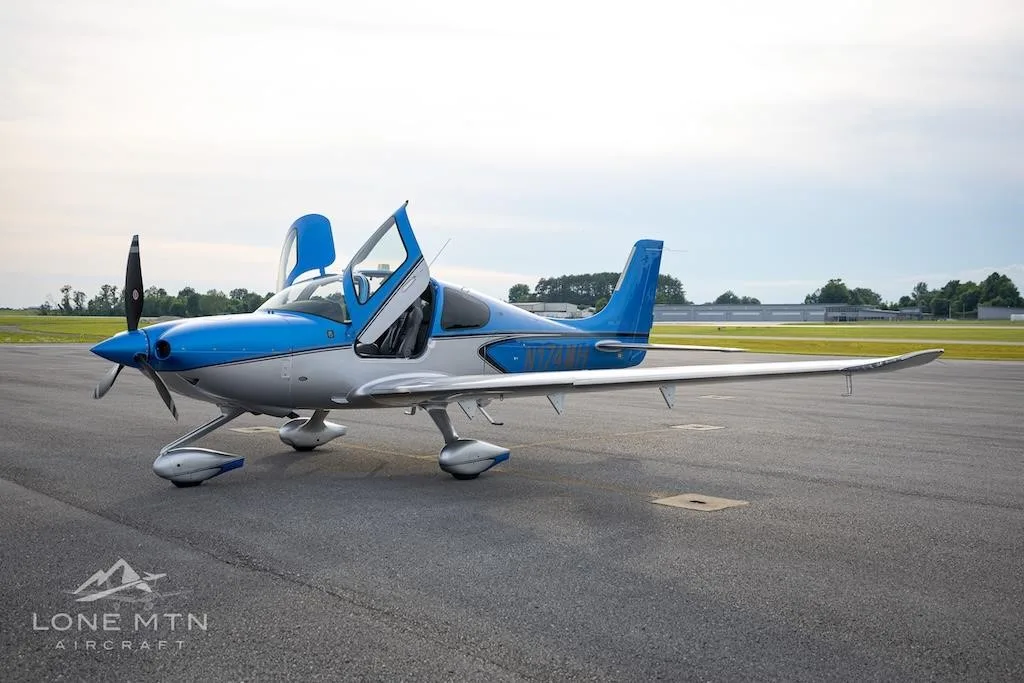 Exterior view of a 2023 CIRRUS SR22-G6 TURBO, N174MH.